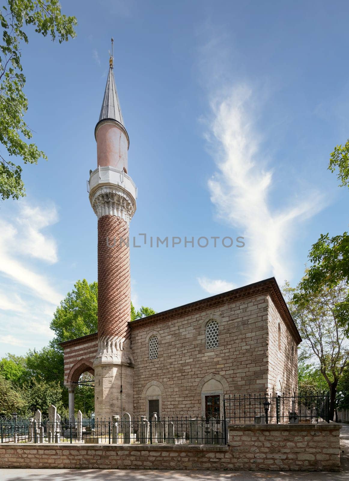 The Burmali Mosque, or Burmali Minare Camii, a 16th century Ottoman mosque built in 1550 on behalf of Emin Nuretti Efendiin, suited in Sarachane park, Fatih district, Istanbul, Turkey