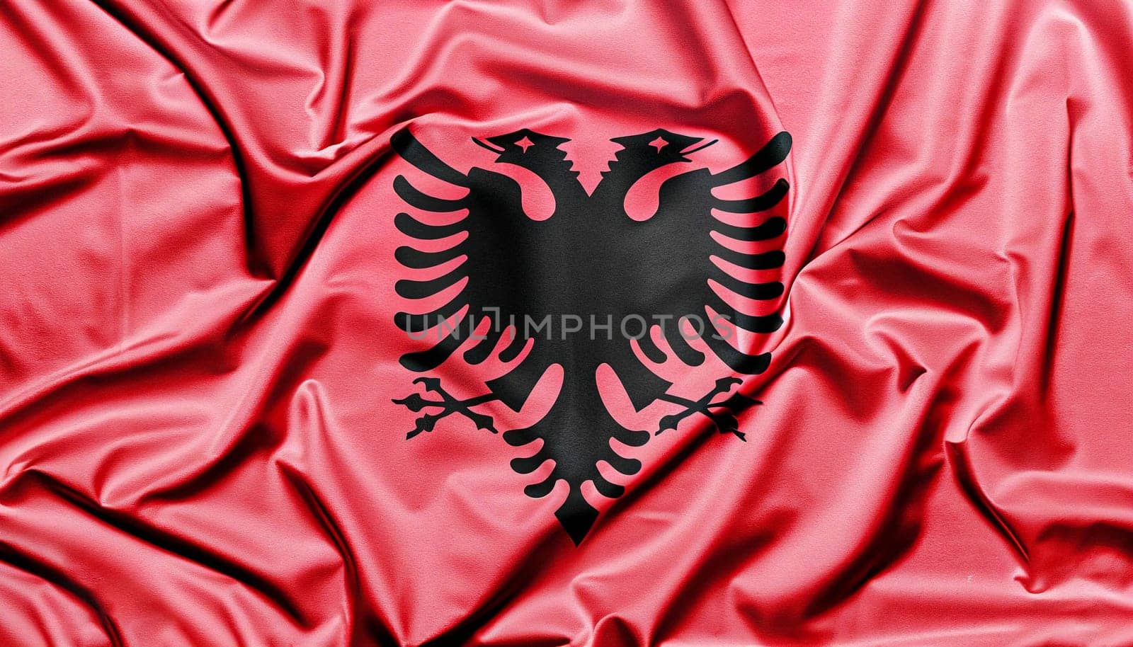 close up waving flag of Albania. flag symbols of Albania.