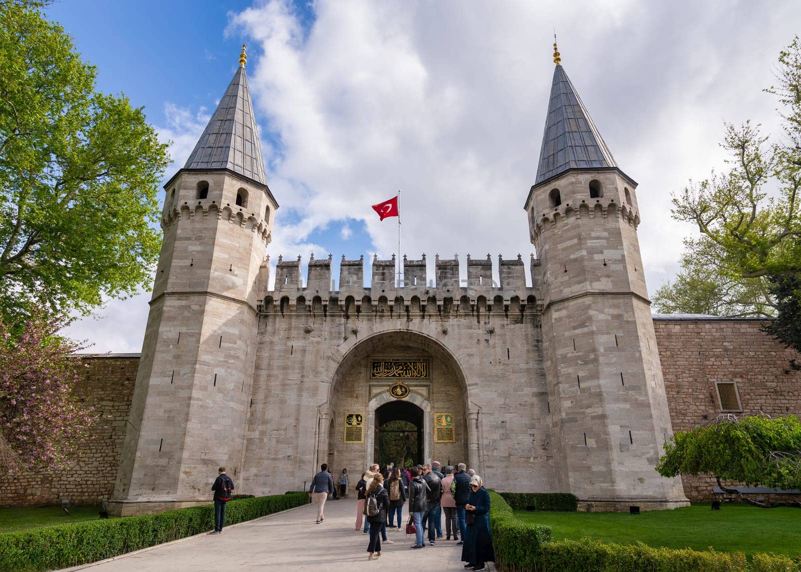Istanbul, Turkey - May 11, 2023: Topkapi Palace: The large Gate of Salutation, aka the Middle Gate, or Orta Kapi, leads to the Second Courtyard of the palace