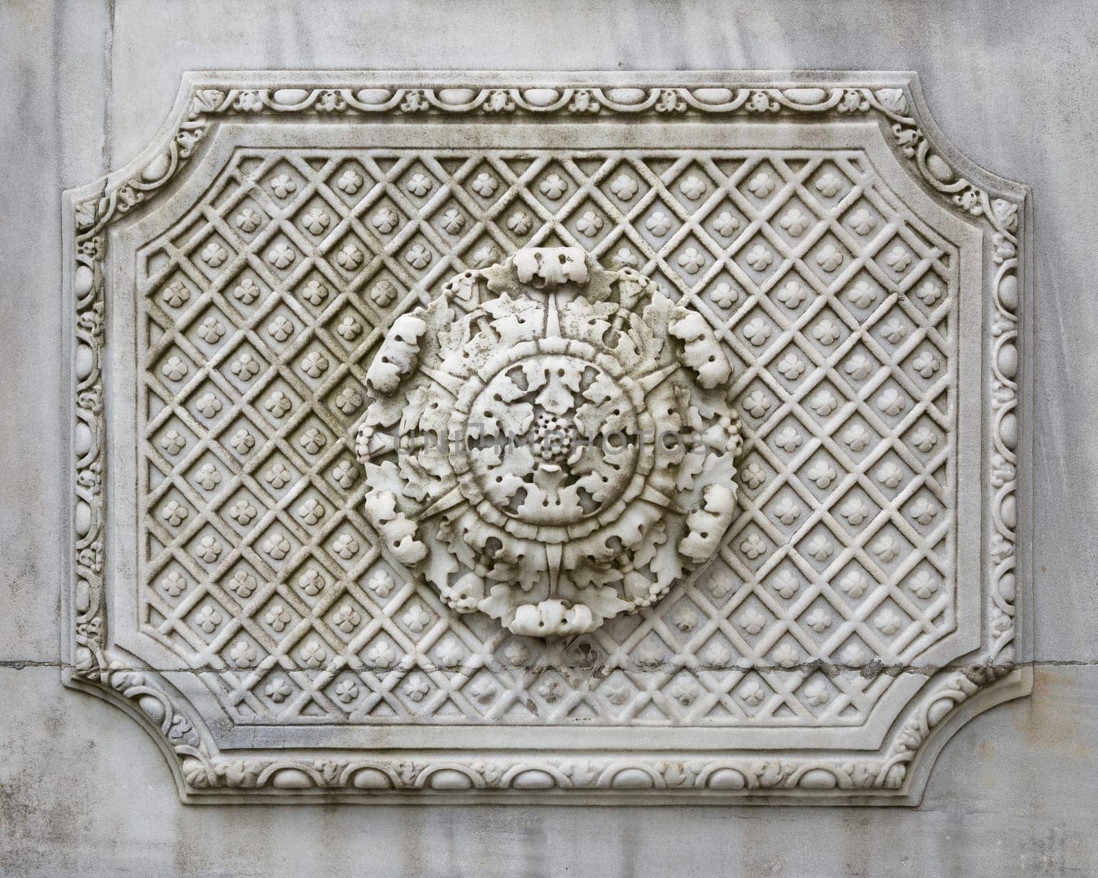 Aged marble wall of imperial Ottoman summer Ihlamur Pavilion with carved pattern ornaments and carved details, Istanbul, Turkey