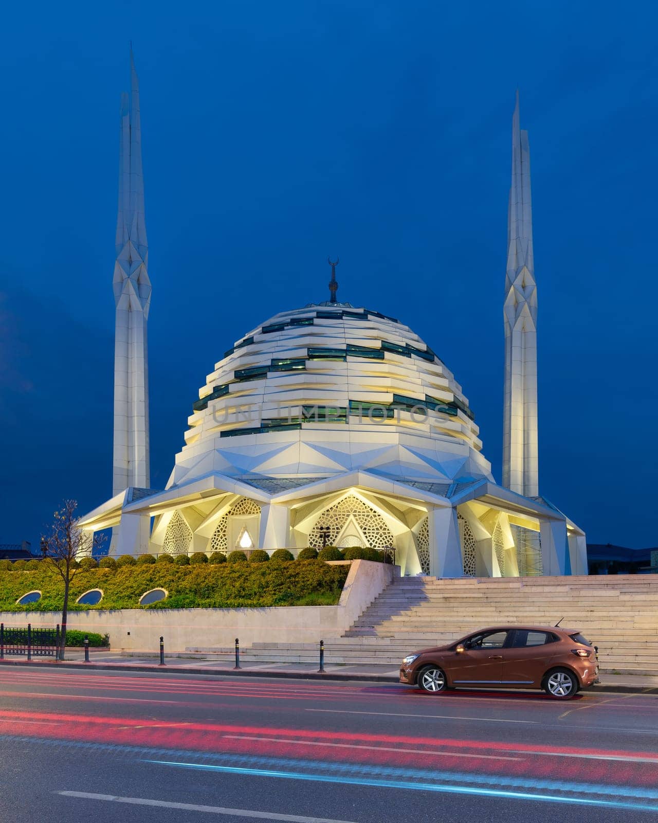 Night shot of Mosque of the Faculty of Theology, Marmara University, a modern Islamic architecture mosque, located in Uskudar district, Istanbul, Turkey