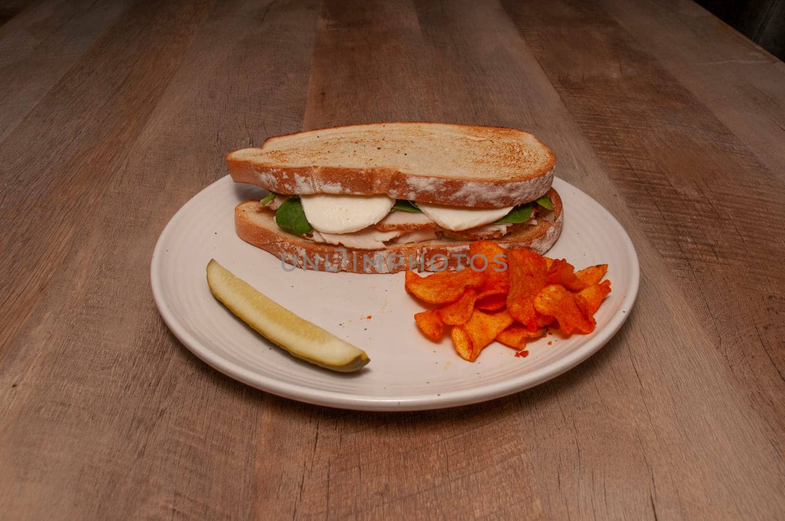 Traditional and authentic American dish known a the chicken caprese sandwich