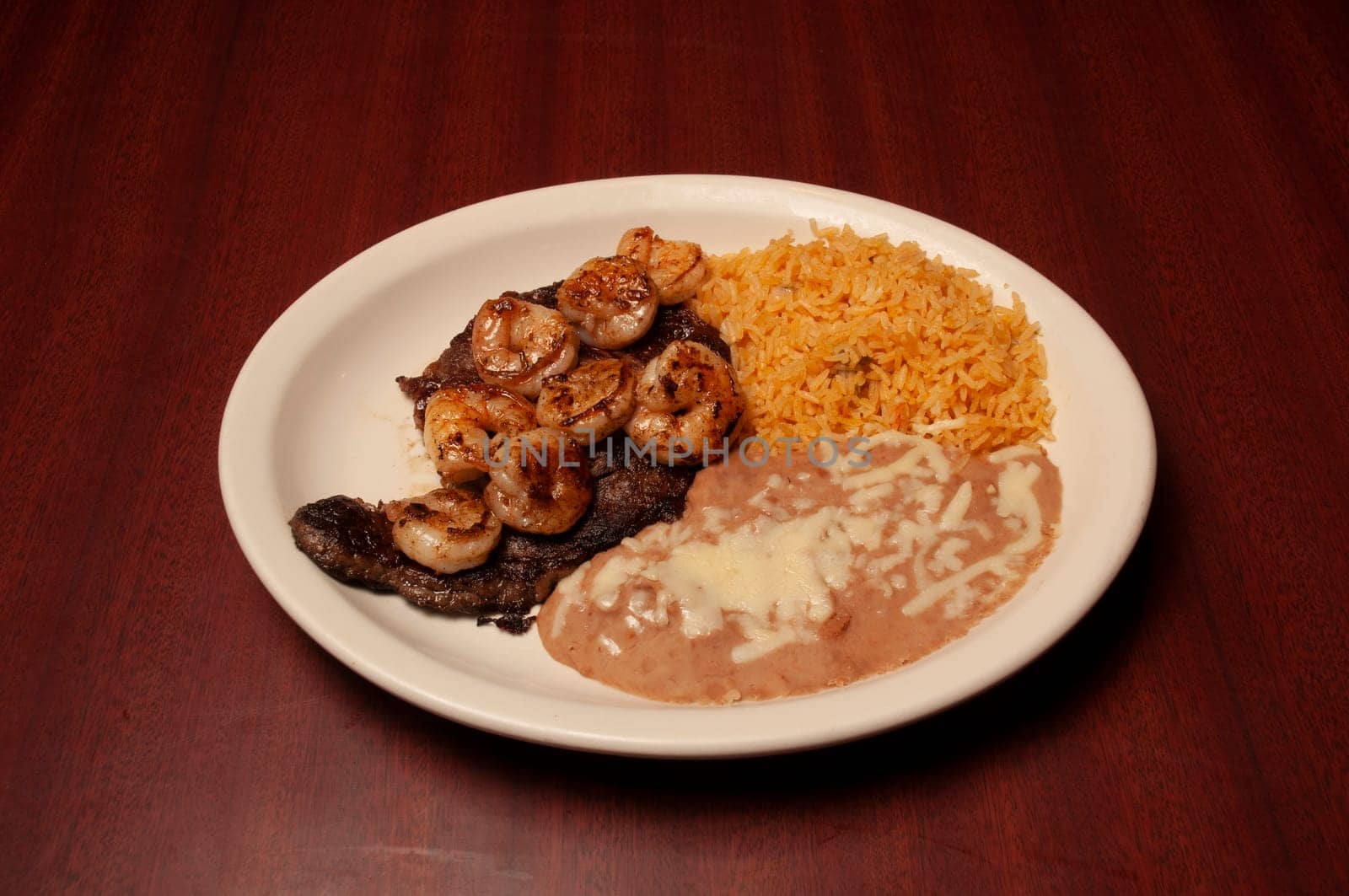 seafood delicacy known as steak and shrimp