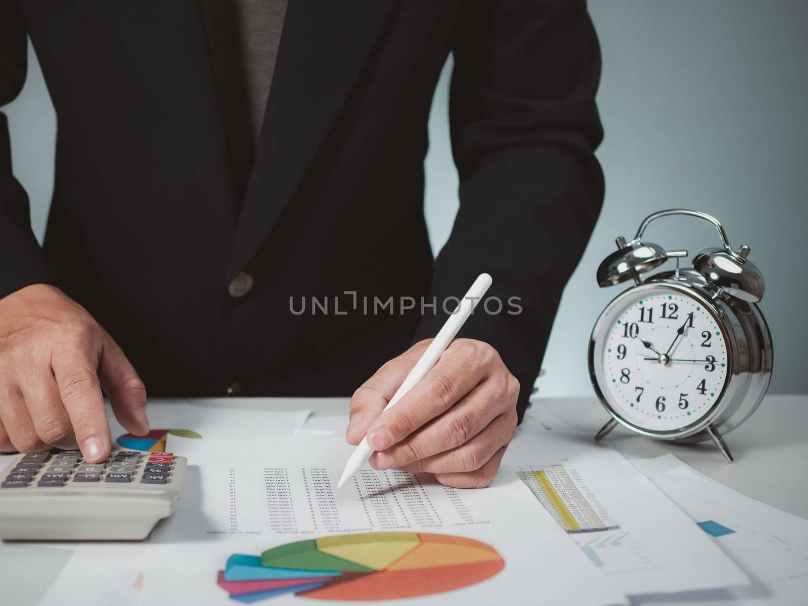 Businessman calculating income To fill out an online personal income tax return form to pay taxes. Financial research. Report. Tax return. Calculation.