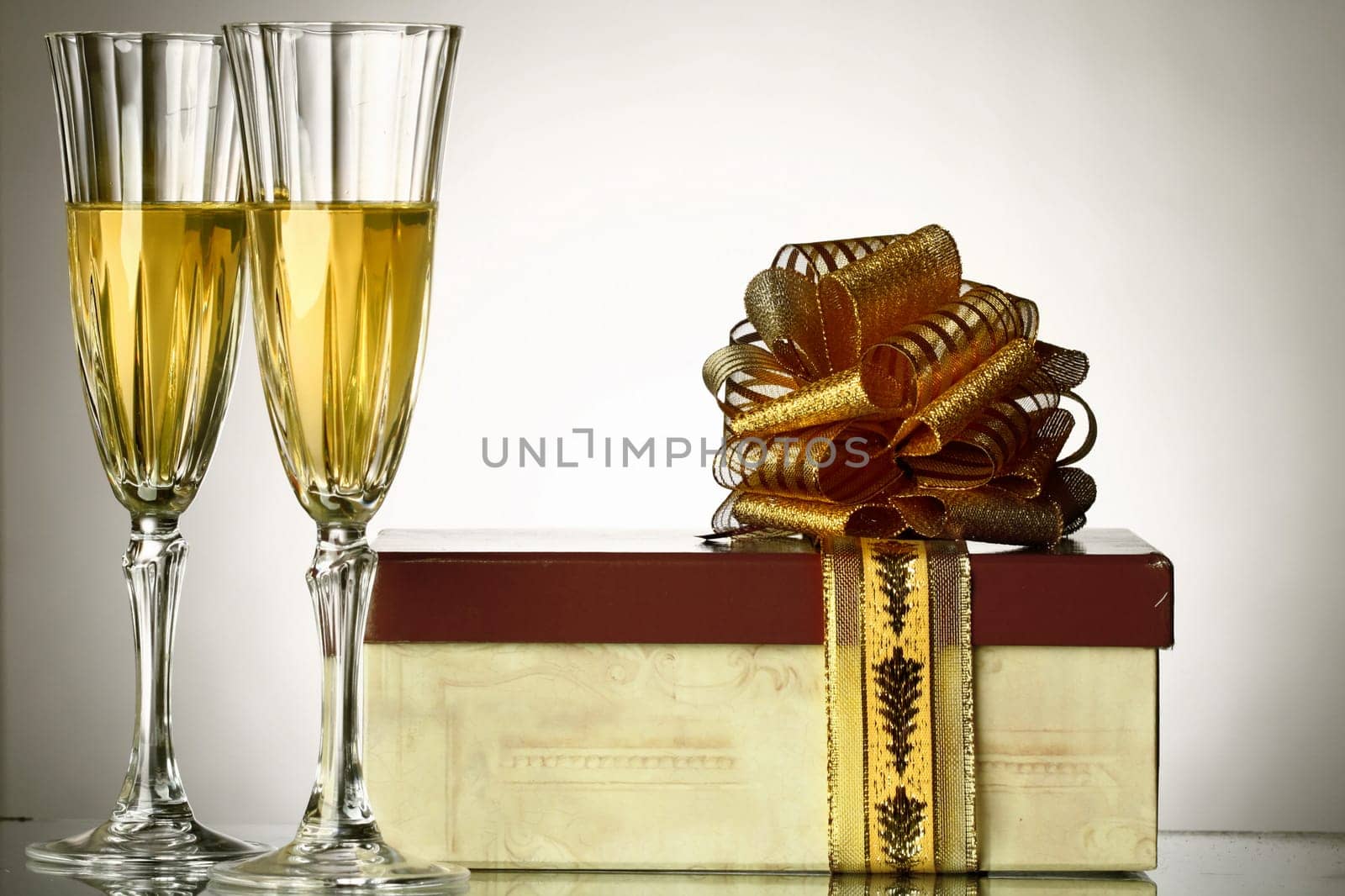 holiday card - golden champagne and gift