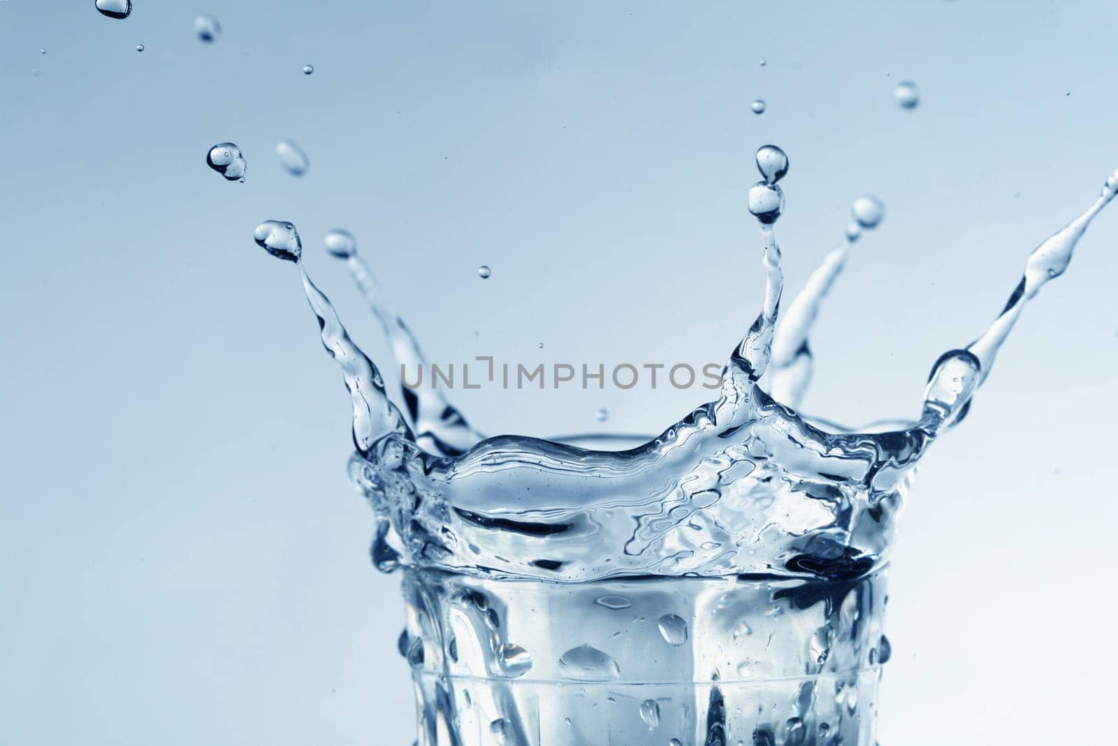super splash in glass on white background