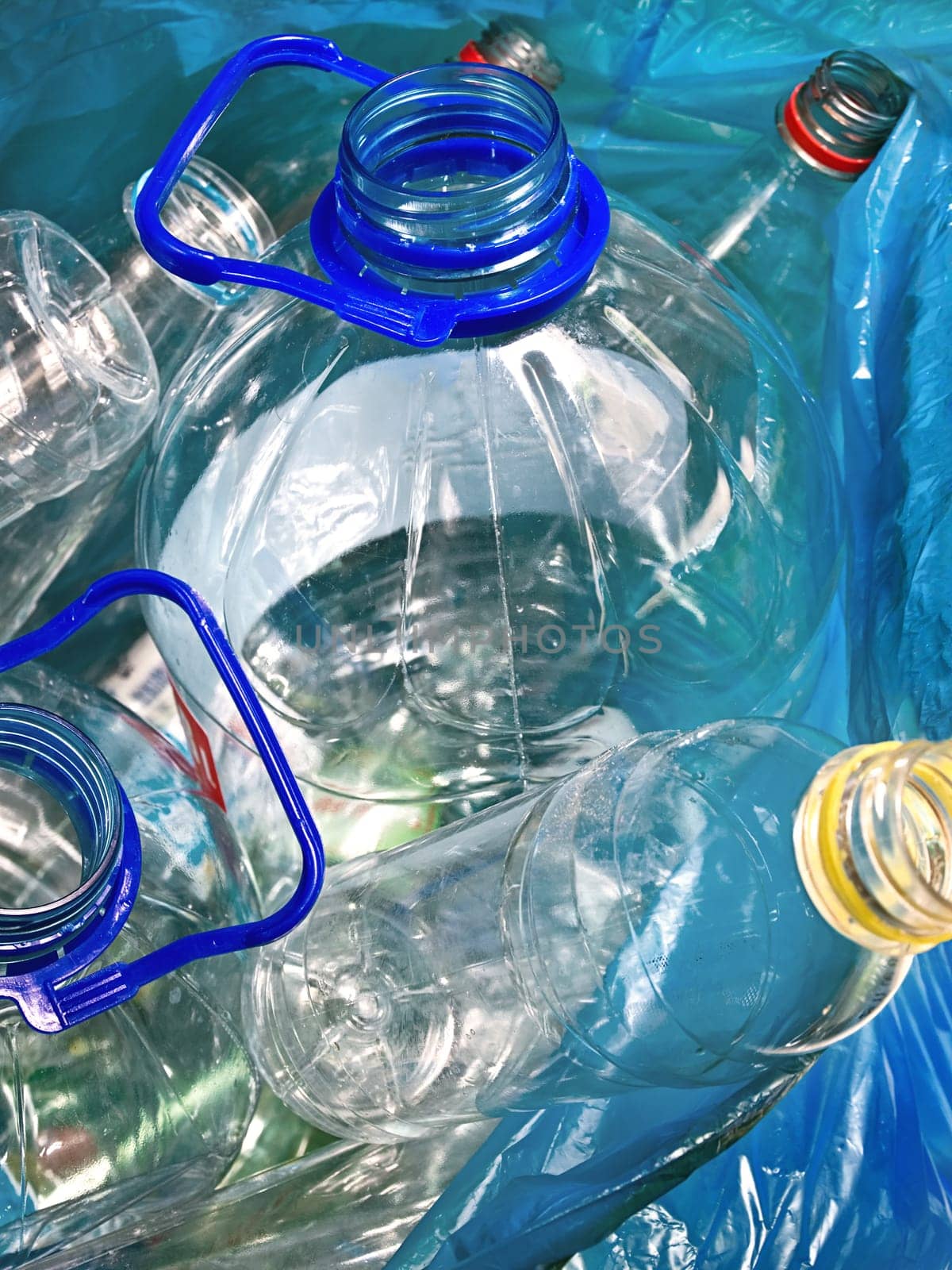 plastic empty bottles in the bag for recycling