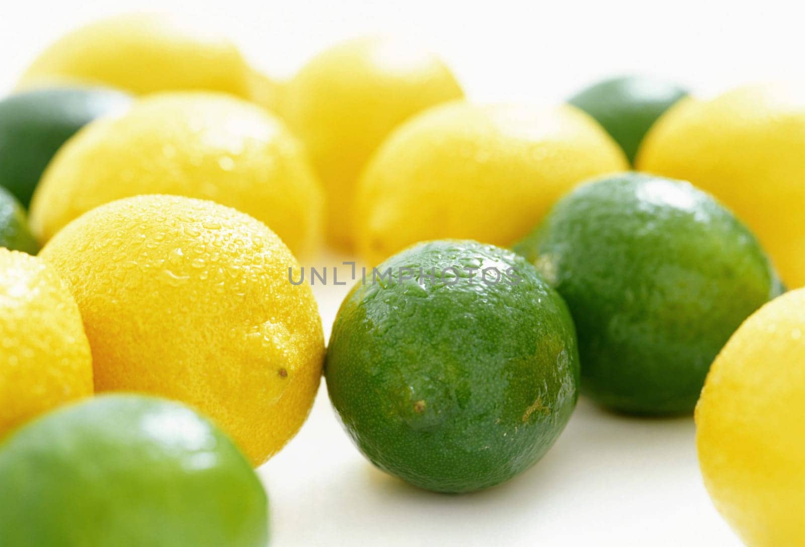 Lemon and lime on white background