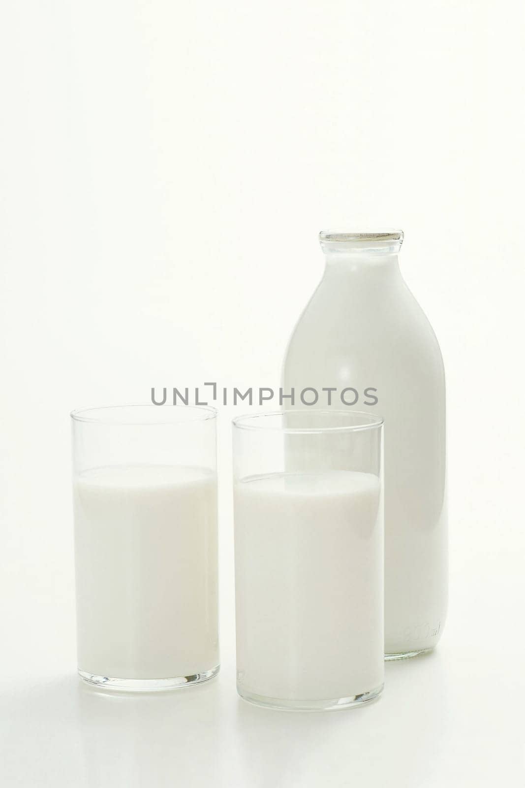 Fresh glasses of milk isolated over white background