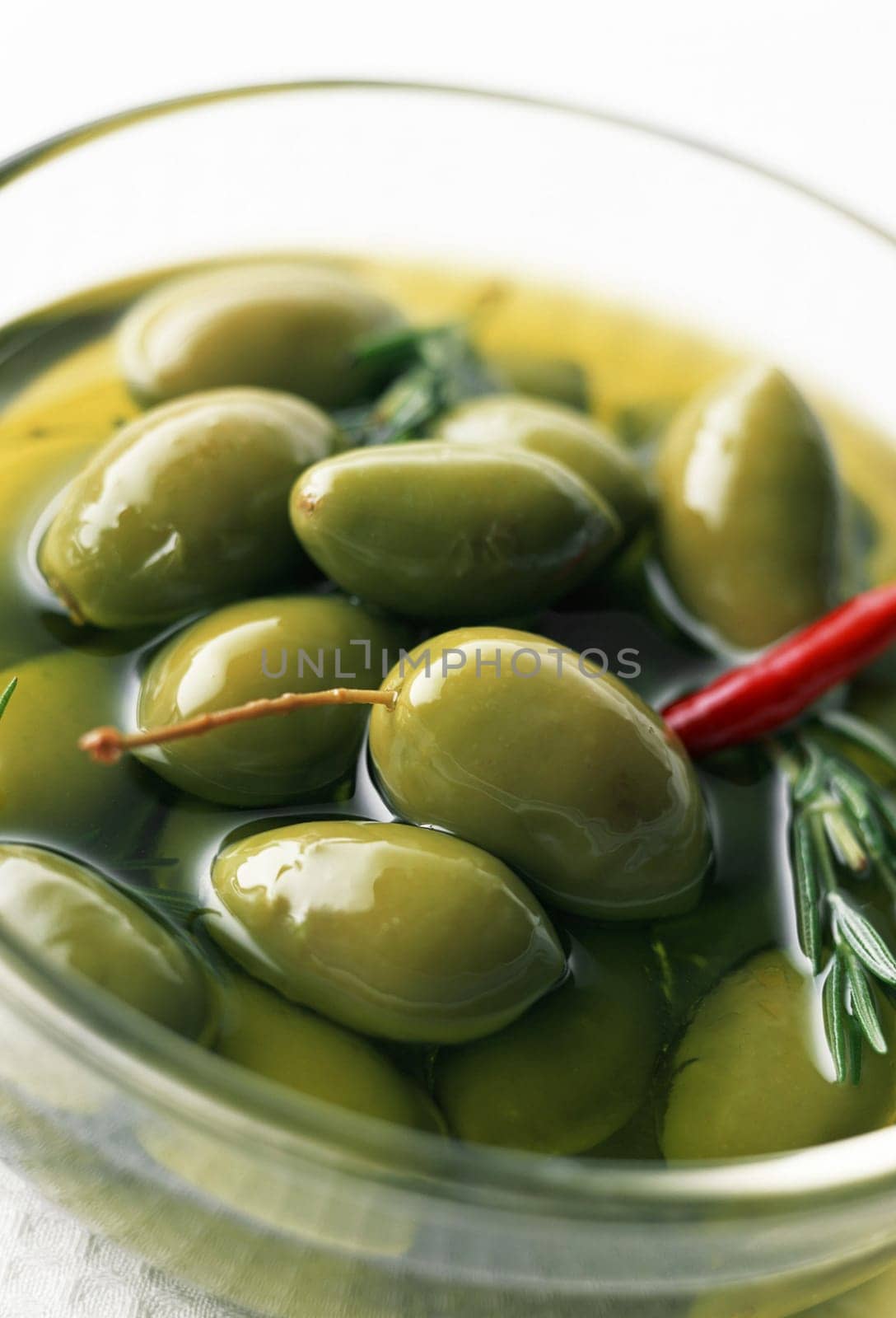Green olive in oil served as salad