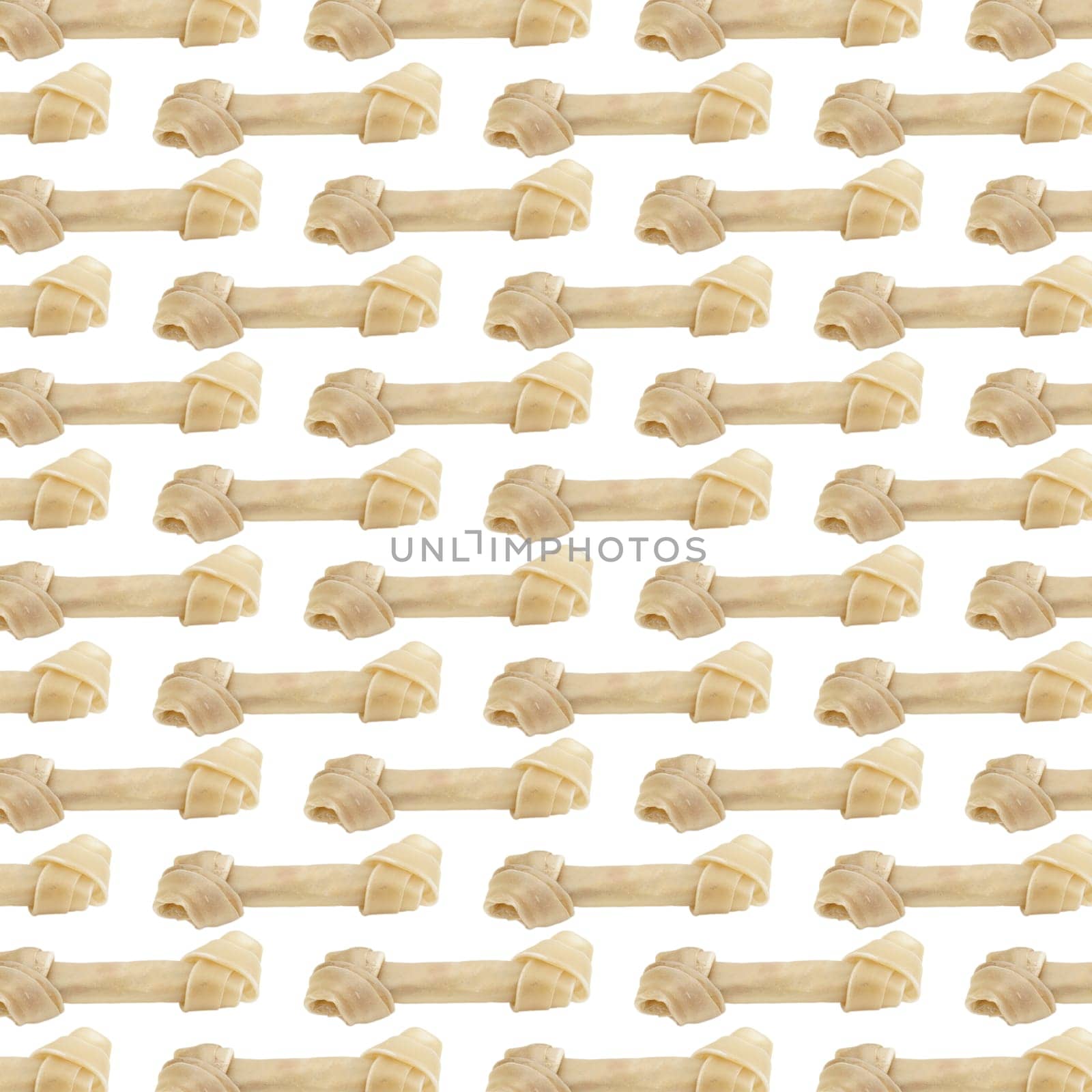 A wallpaper background made of rawhid dog bones.