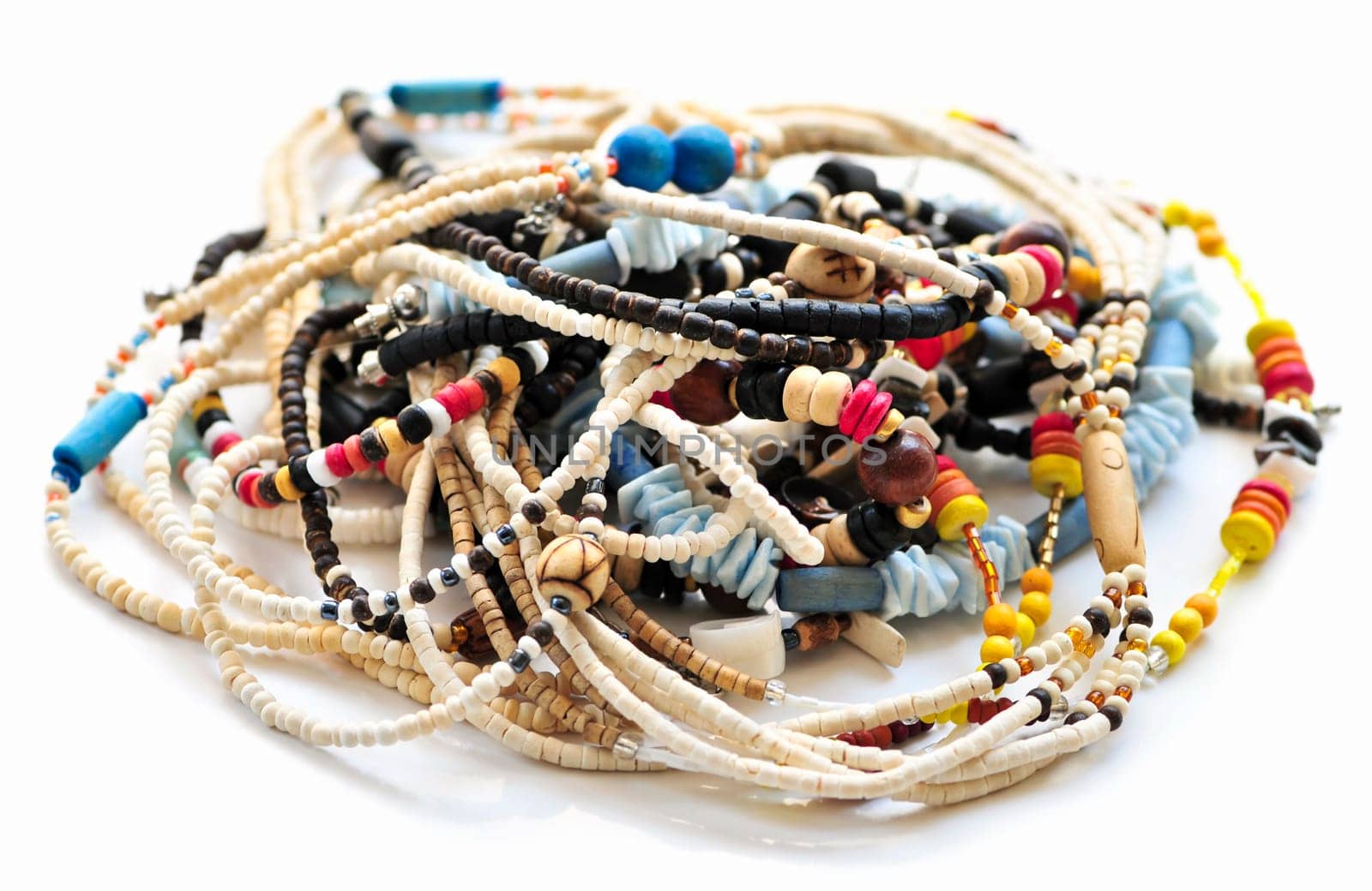 Wood and seashell bead necklaces close up