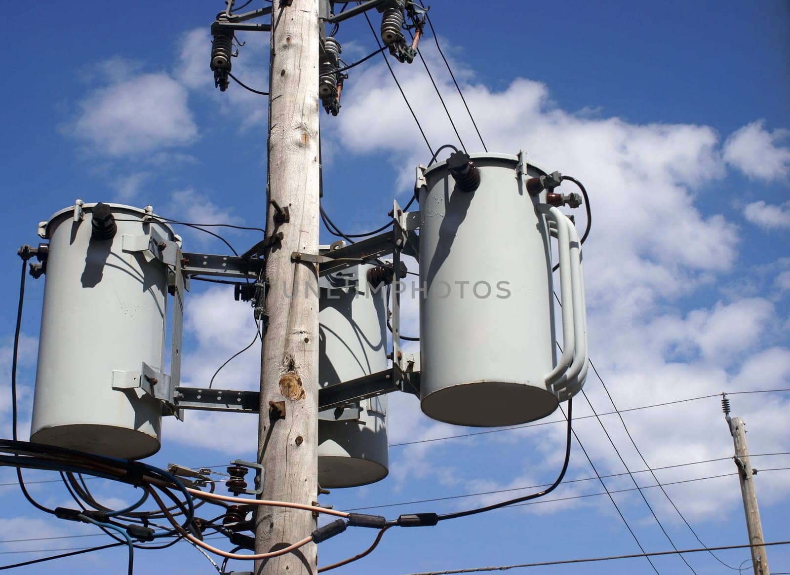 A close-up shot of a hydro pole transformer.