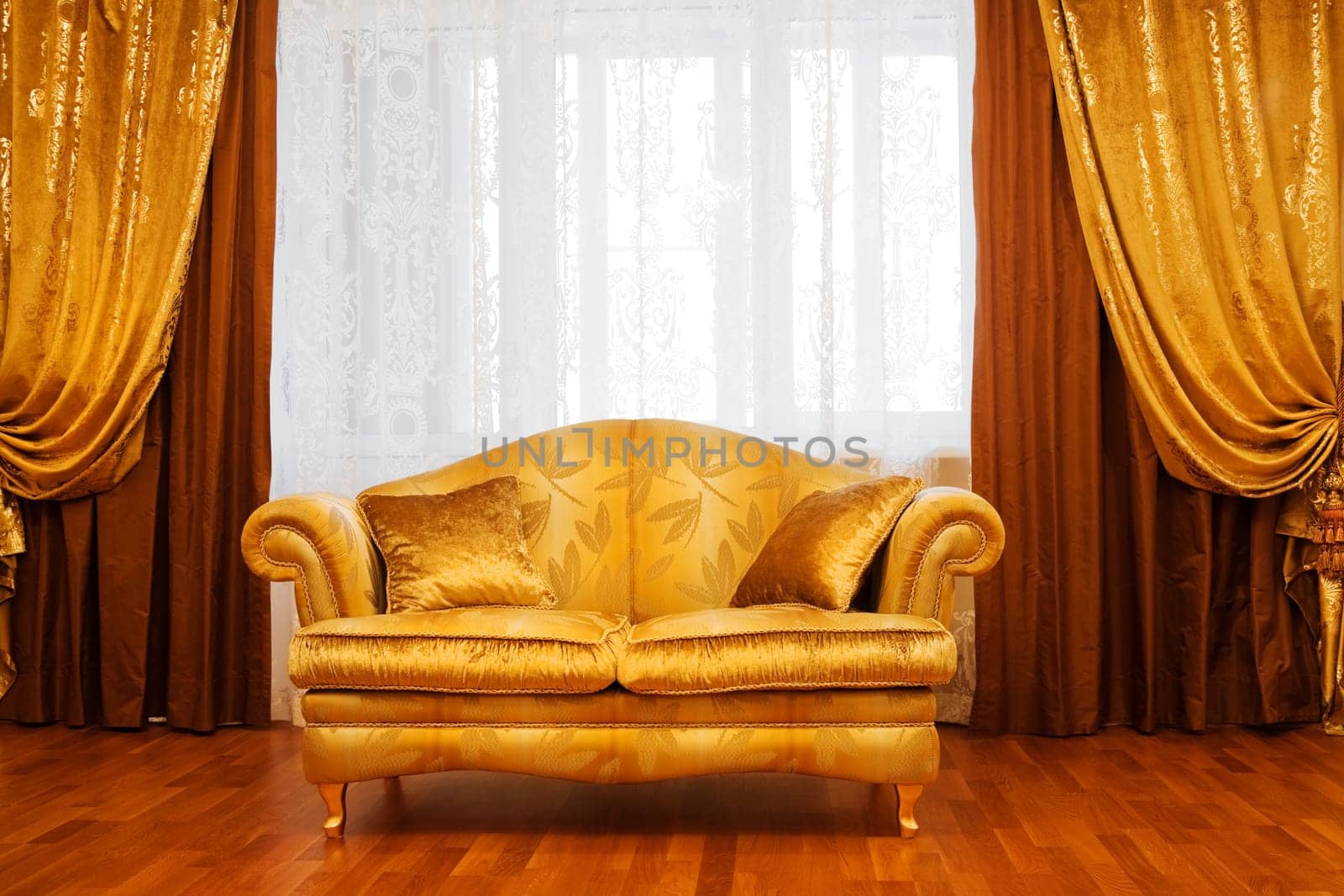 Beautiful sofa at a window in a modern apartment