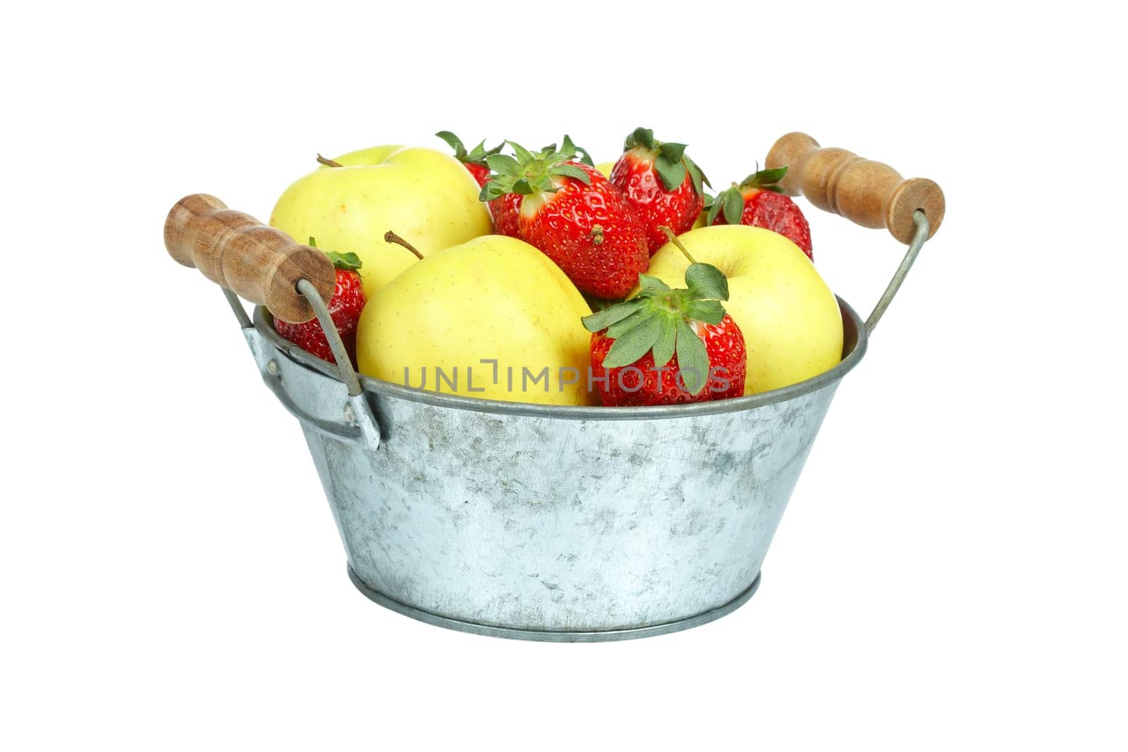 Bowl of strawberries and apples isolated on white background. Shallow depth of field