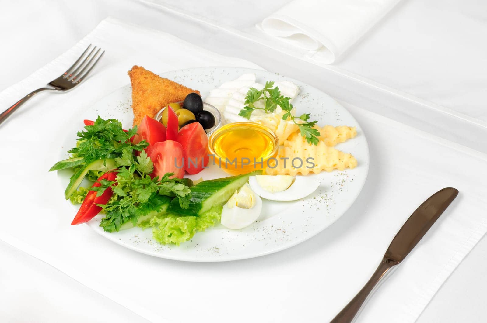 light healthy breakfast served on white tablecloth