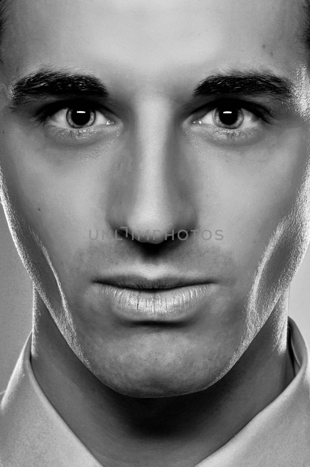 A Fashion  Closeup Of A Male Model In Monotone