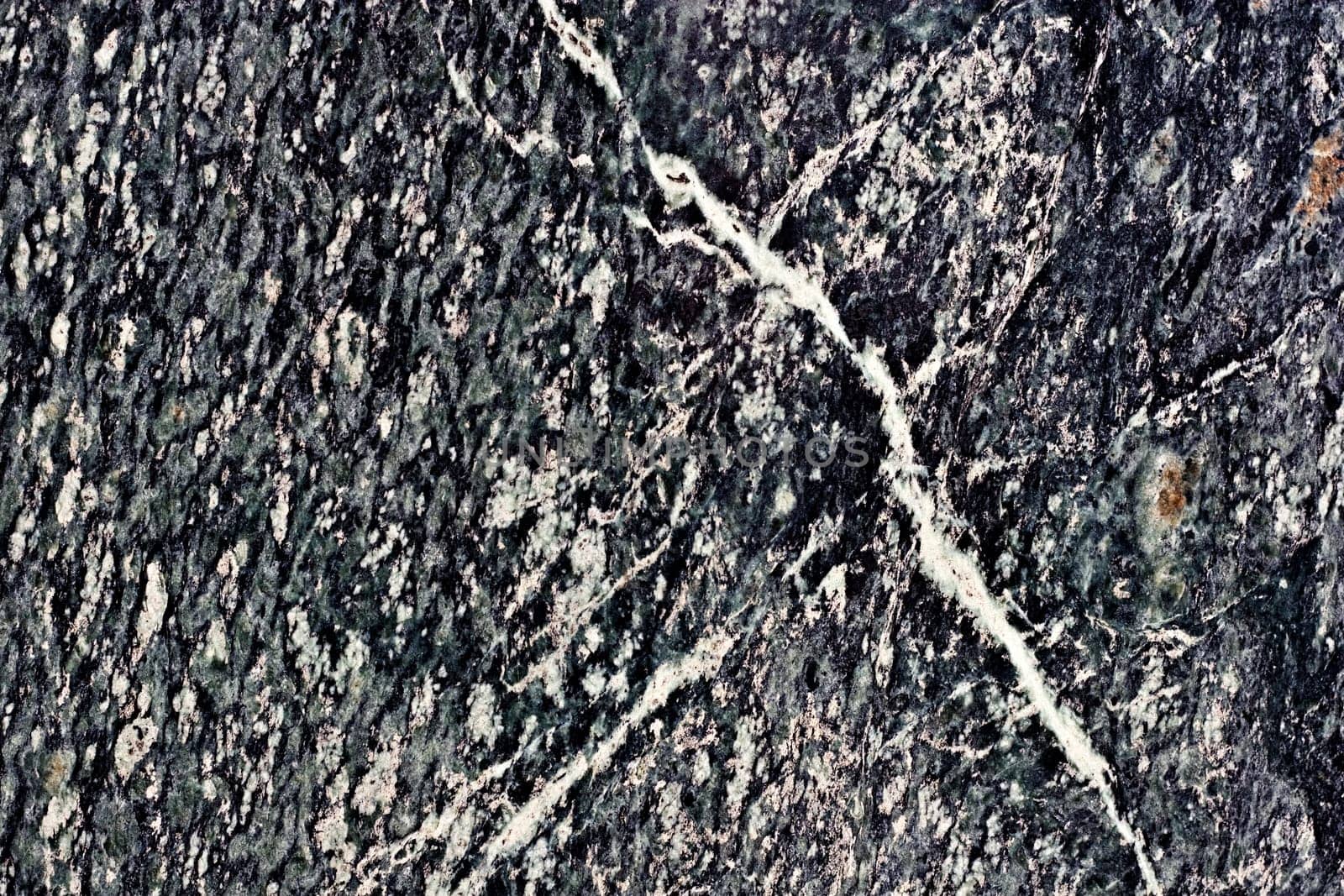 close up of a polished grey marbled granite texture