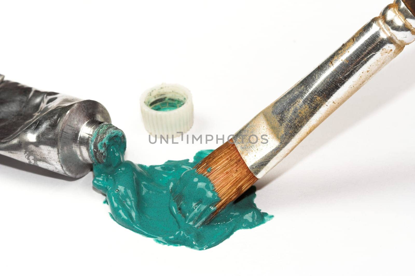 brush and green paint close up