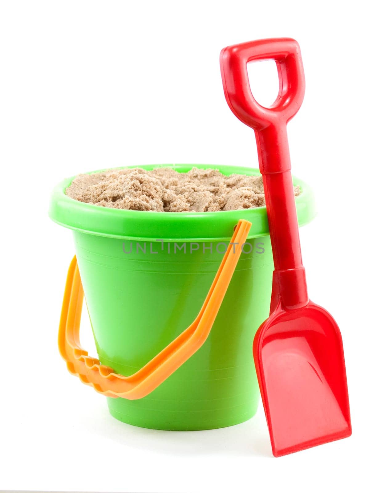 bucket and spade close up on white background