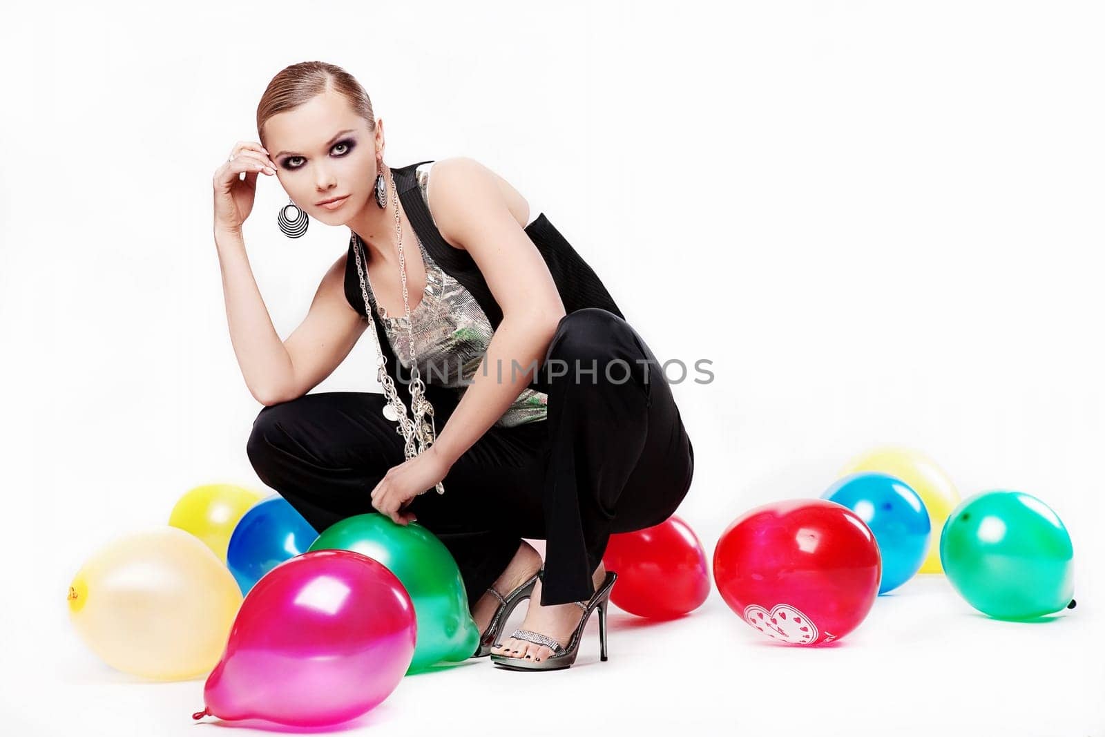 pretty stylish girl with balloon on white background