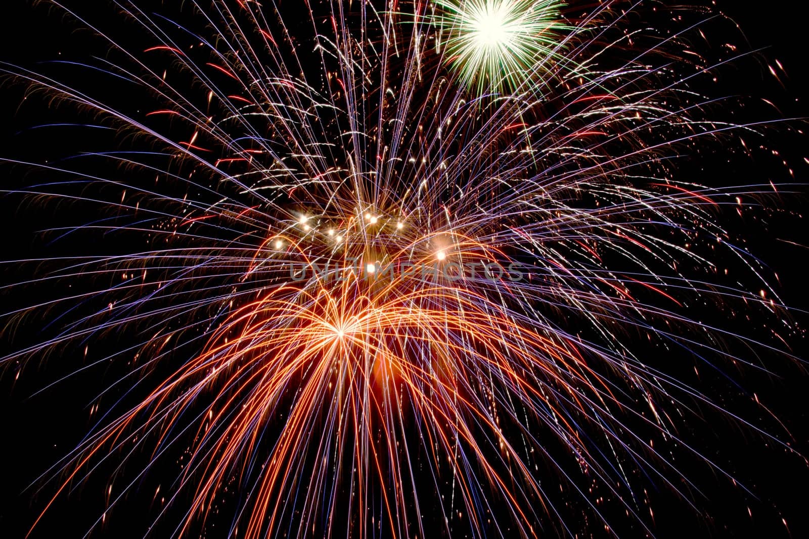 bright colored fireworks on black background