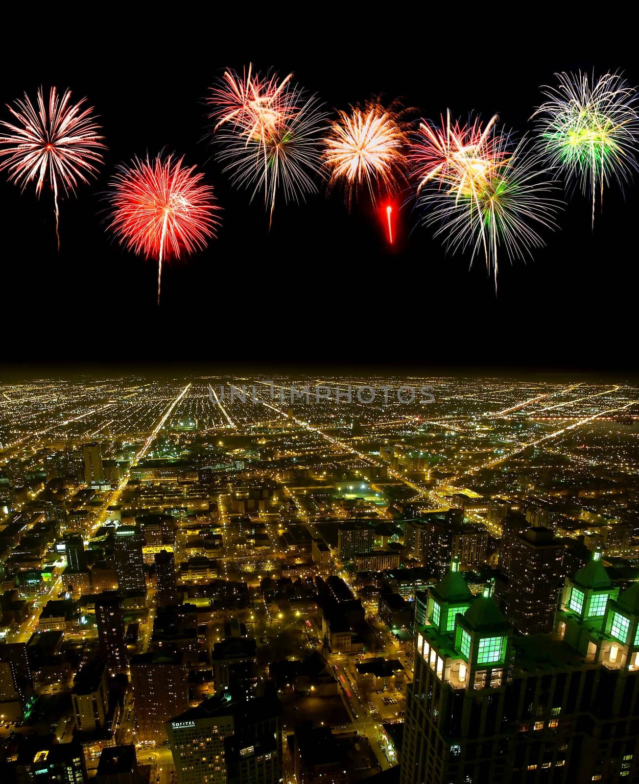 Aerial view of Chicago cityscape at night - with firework illustration