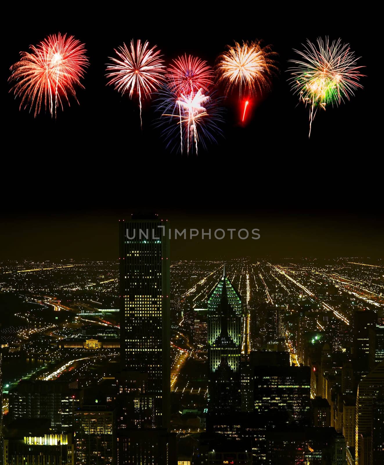 Aerial view of Chicago cityscape at night - with firework illustration