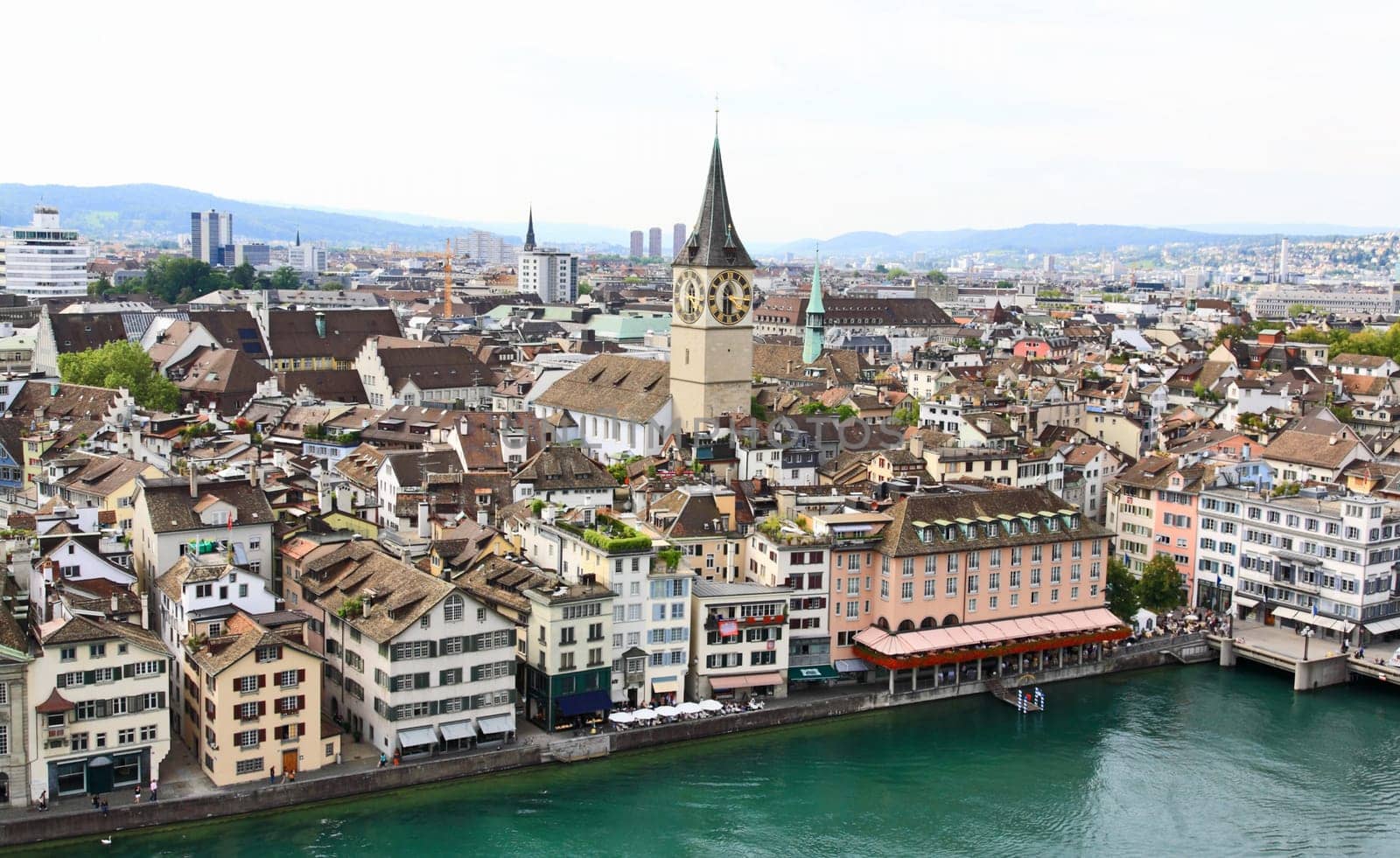 The aerial view of Zurich cityscape from the tower of famous Grossmunster Cathedral