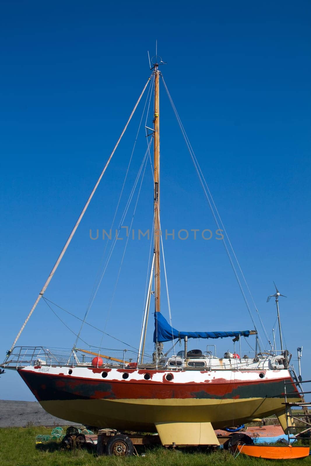 Sailing boat being repaired on the Holy Island of Lindisfarne