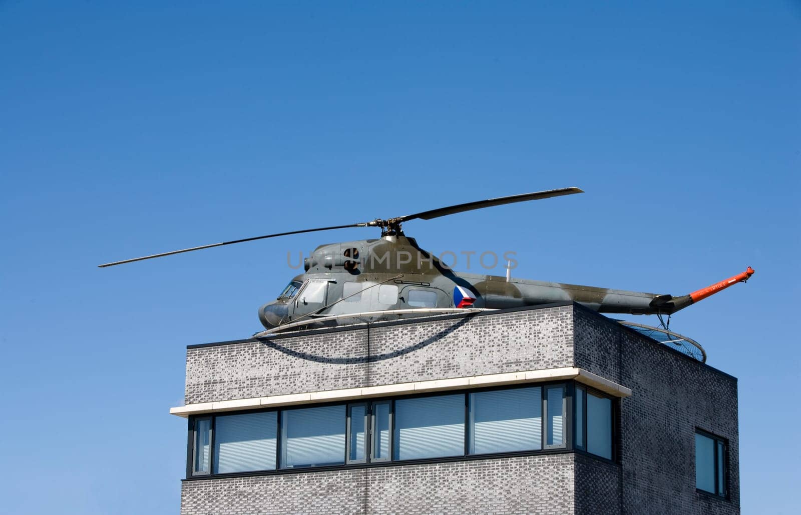 Helicopter on the rooftop of an office building in Maasdijk, the Netherlands