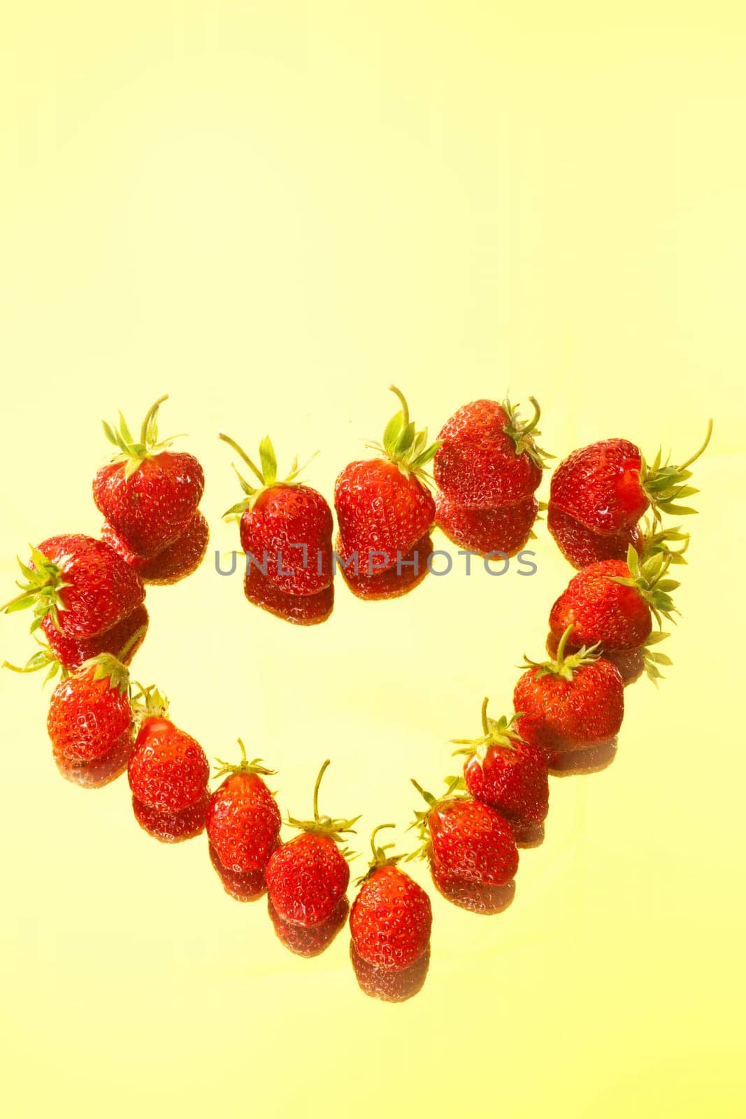 food series: red strawberry on the yellow background