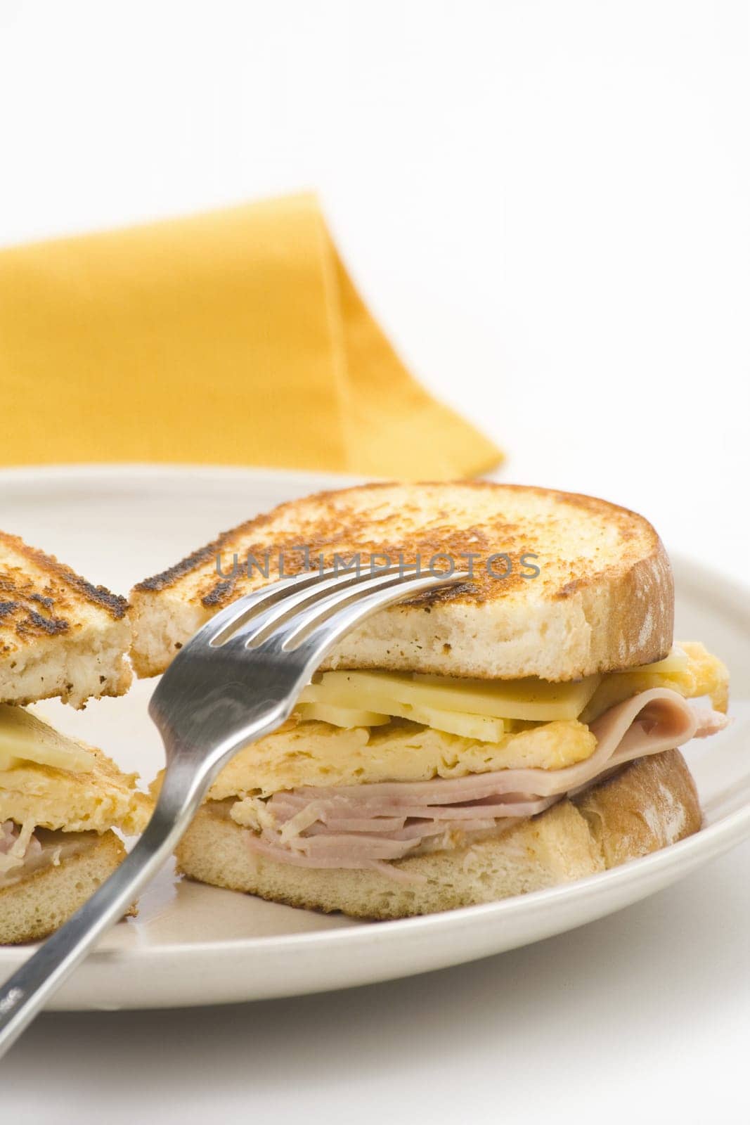 tasty sandwich of ham and cheese omelet isolated