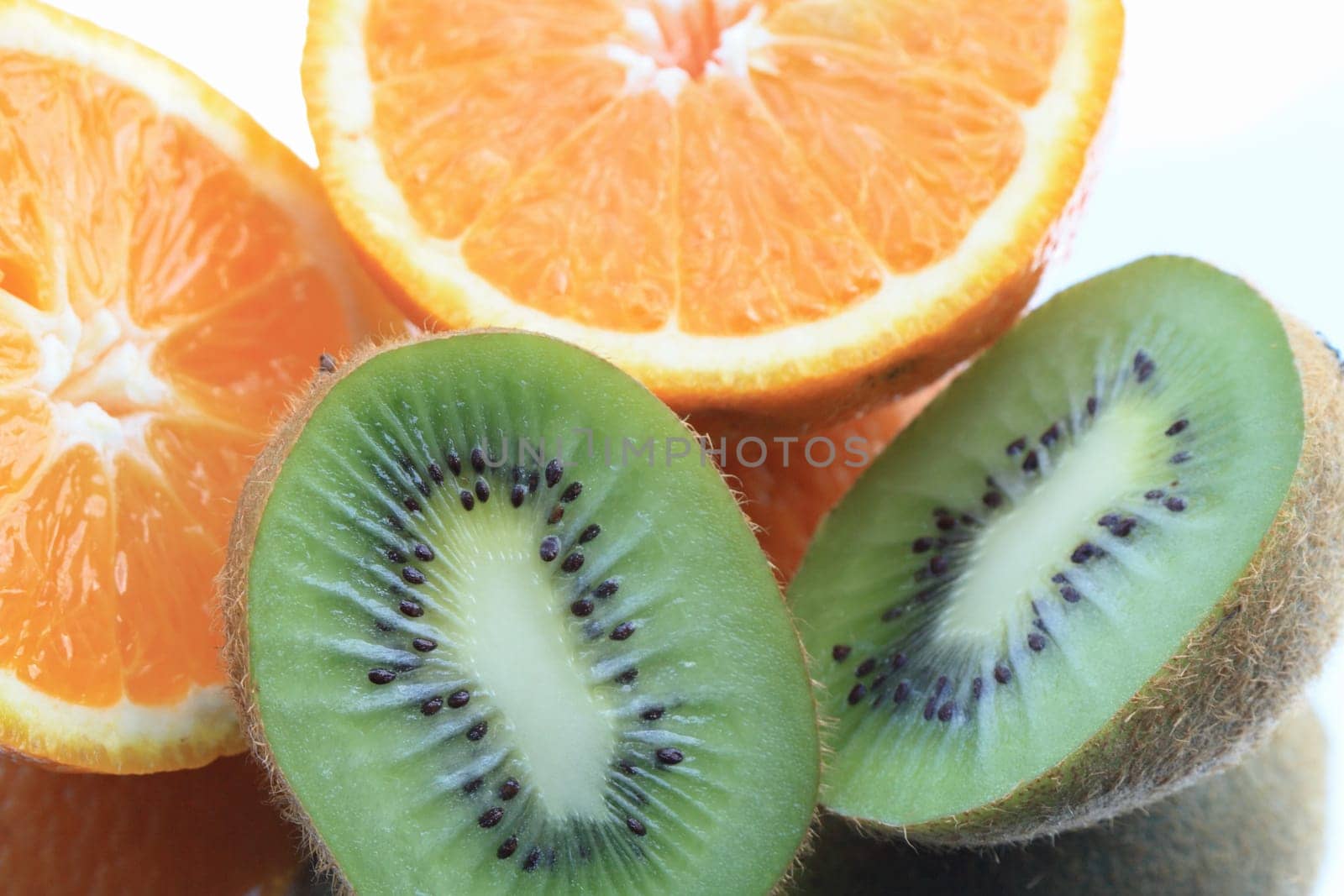 Close-up of sliced orange and kiwi fruit