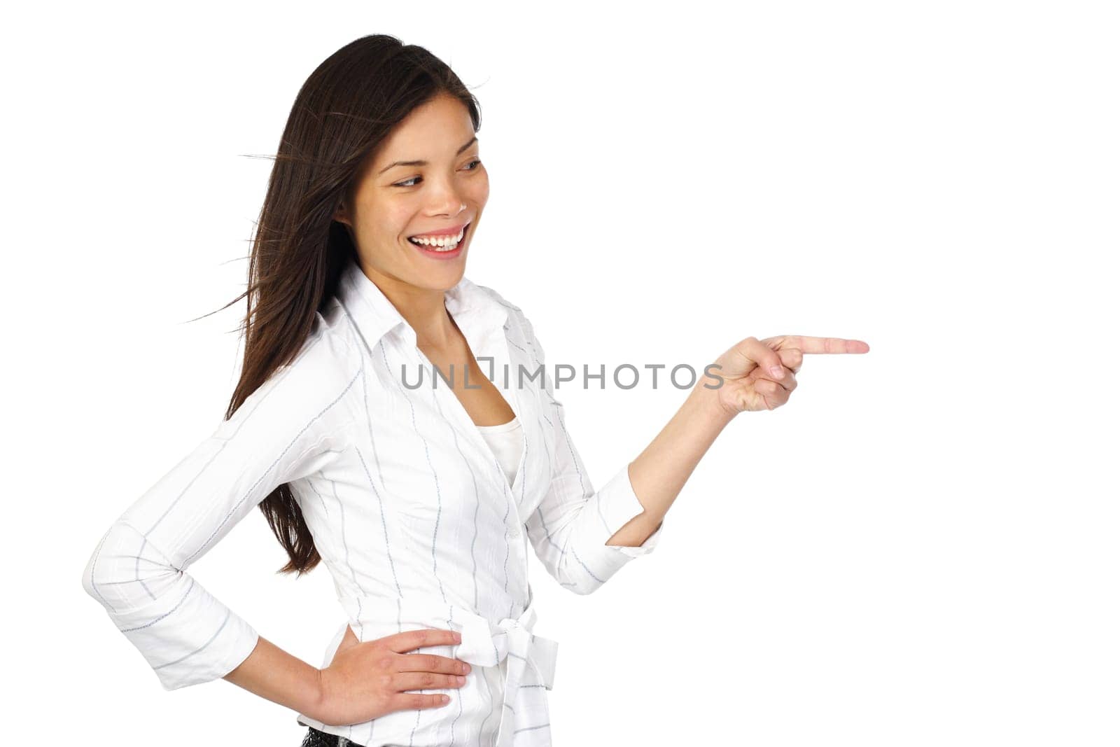 Beautiful happy woman pointing at something...
