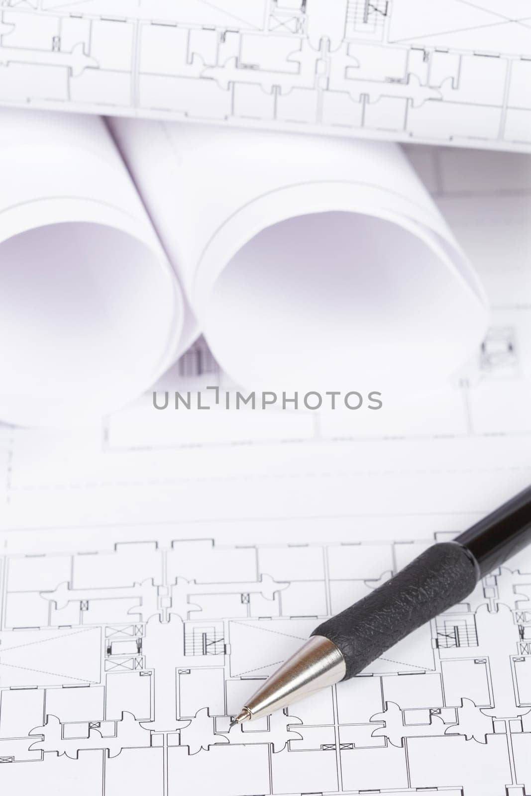 Construction plans and automatic pencil. Shallow depth of field