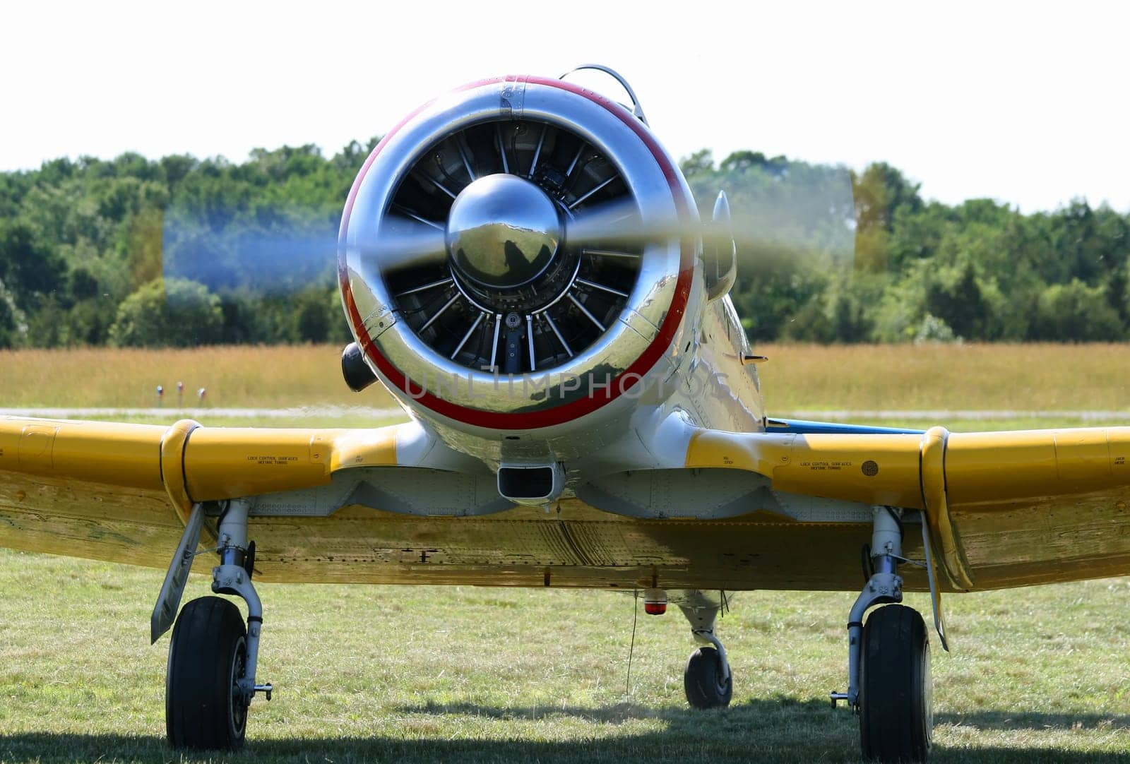 an old airplane displayed in field