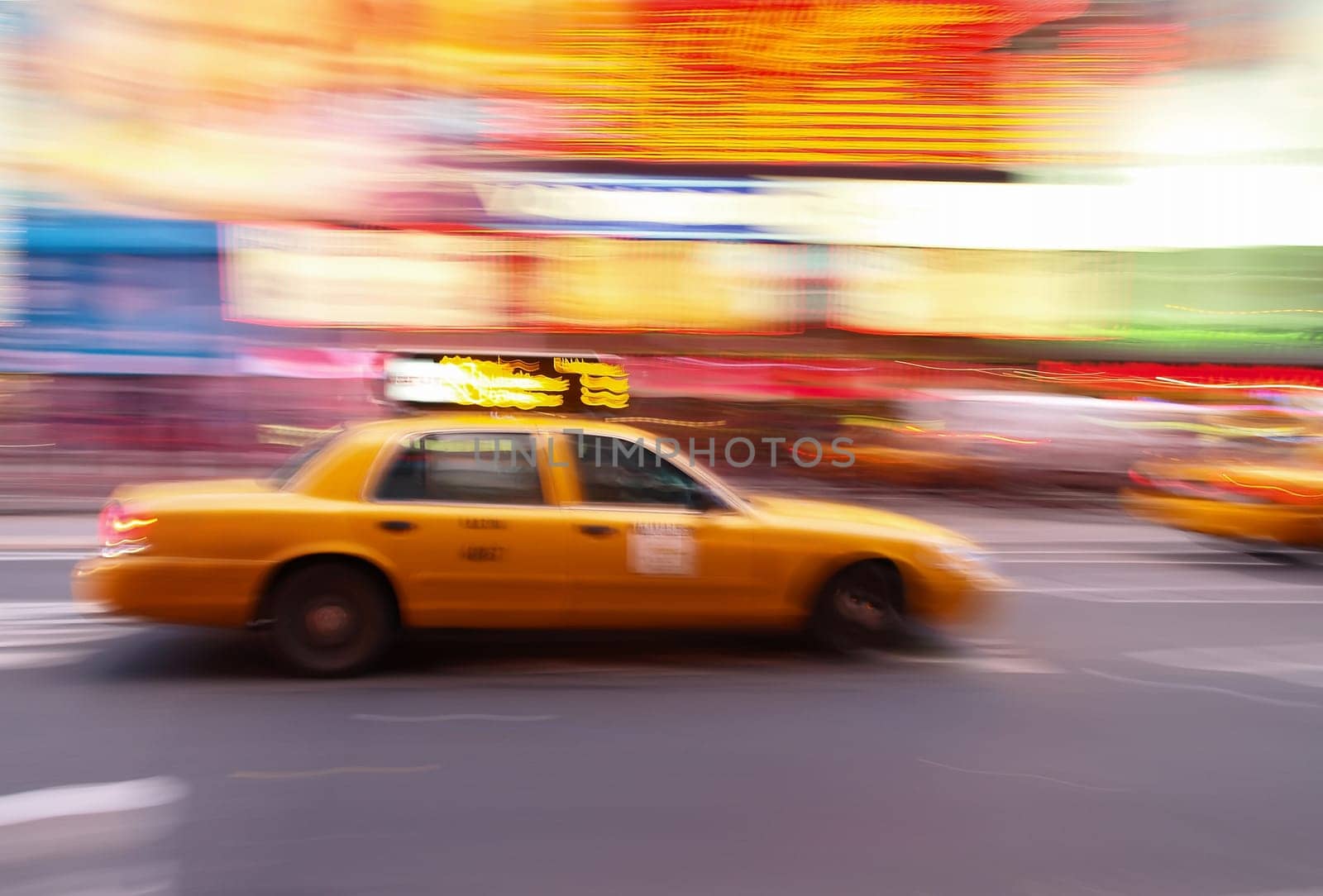 Taxi at times square at night in New York City