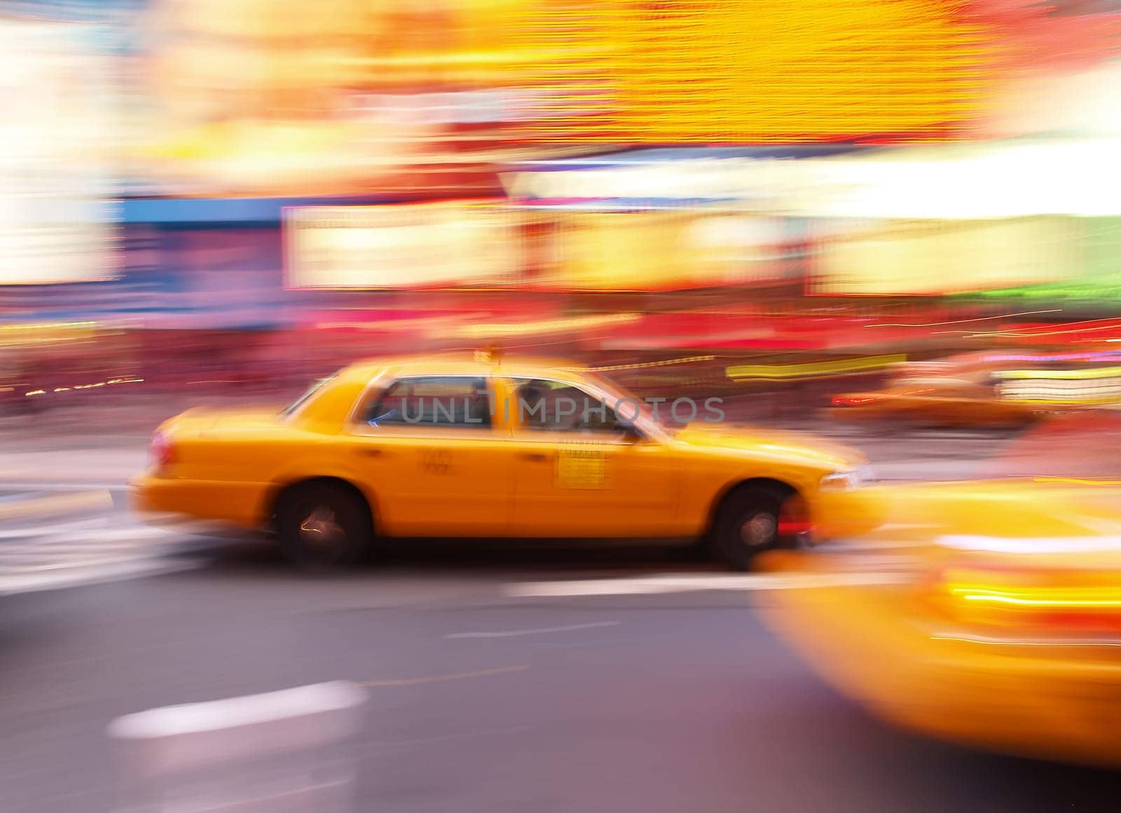 Taxi at times square at night in New York City