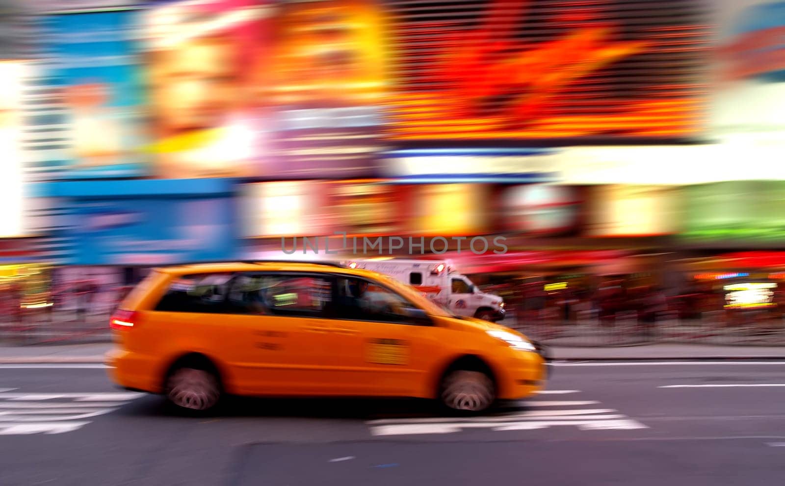 Taxi at times square at night in New York City