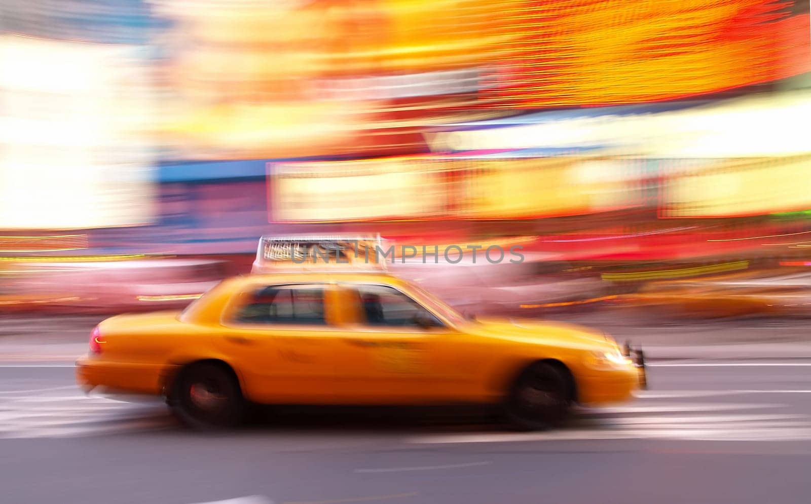 Taxi at times square at night in New York City