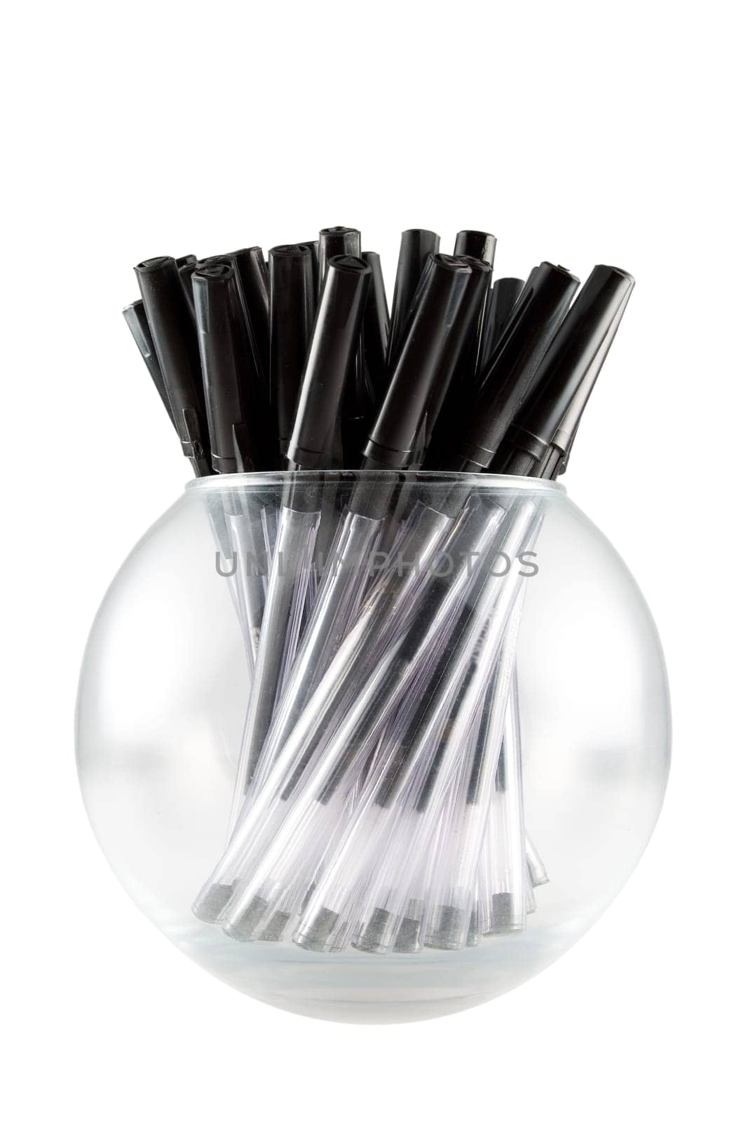 a clear glass ball full of black pens
