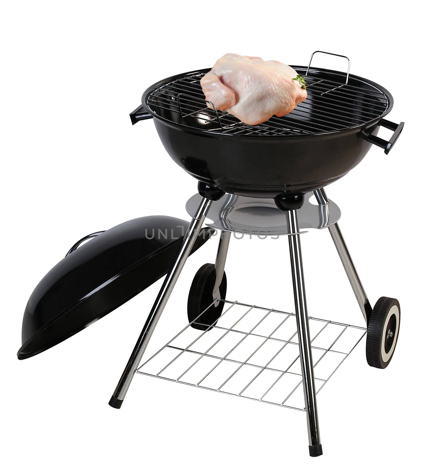 Whole chicken on barbecue grill.