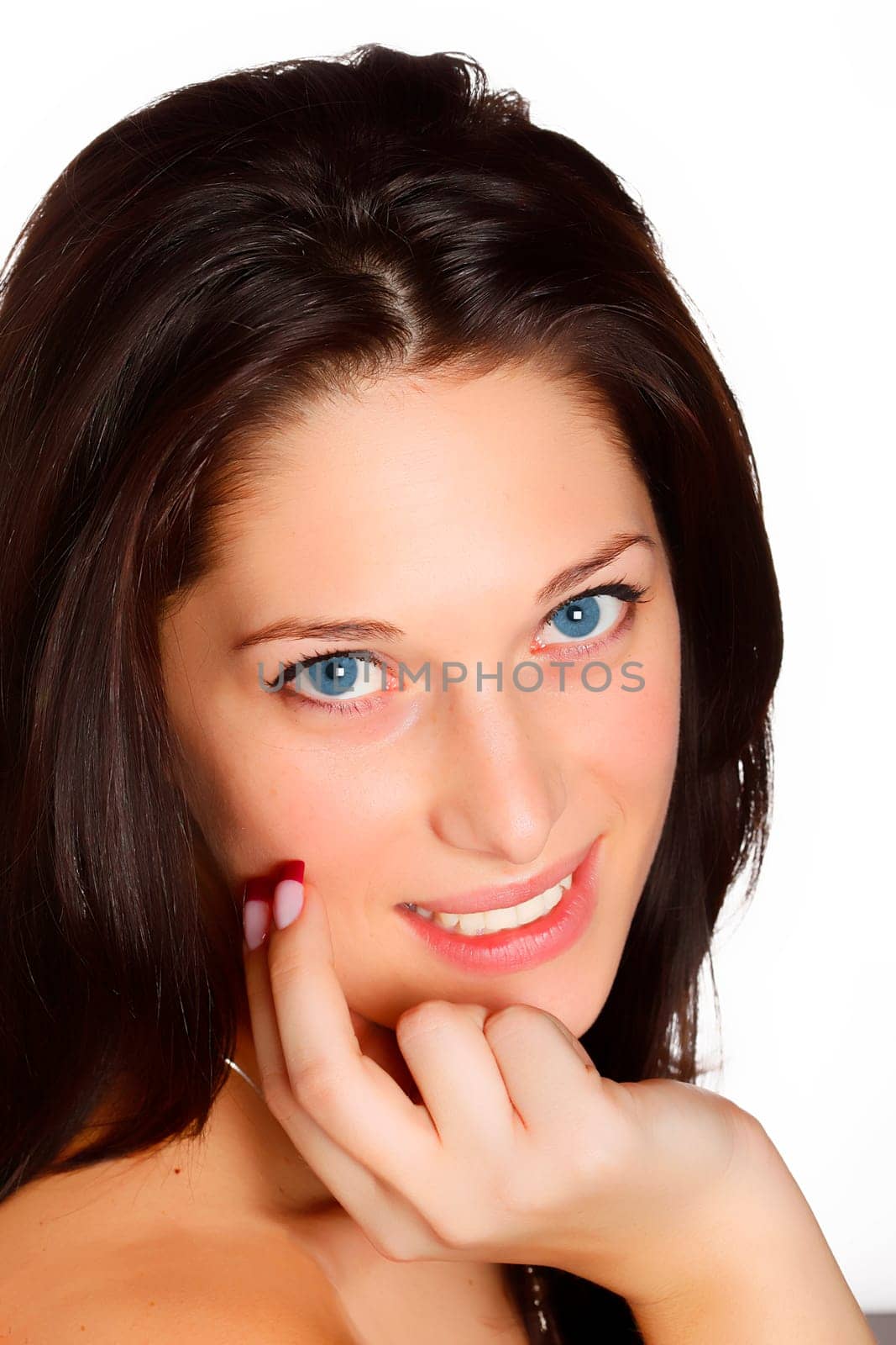 Portrait of a smiling young woman with black hair