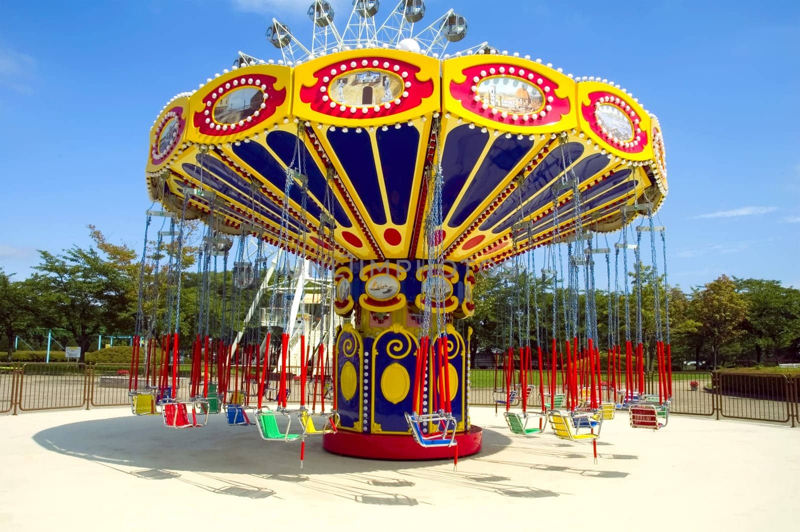 Colorful carousel in atraction park