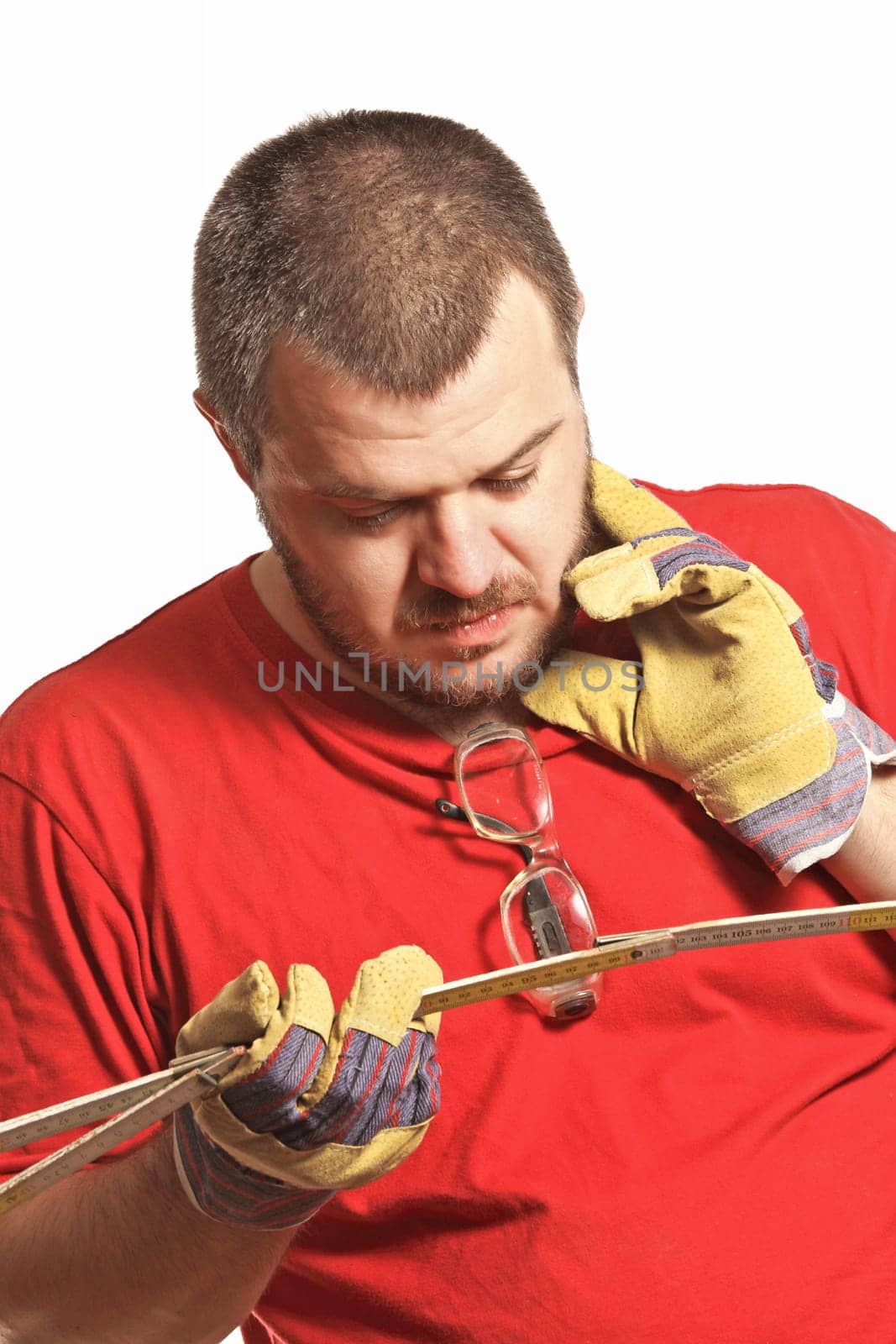 fine close up portrait of caucasian manual worker with tool