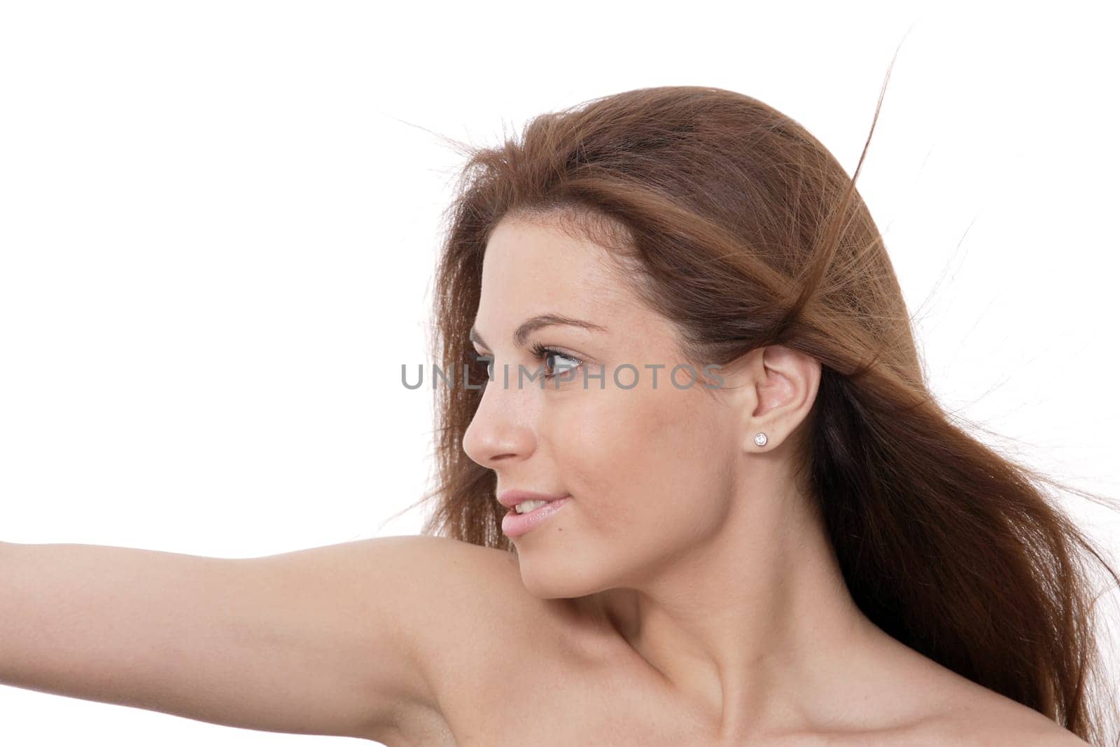 Closeup portrait of a happy young woman smiling isolated on white background
