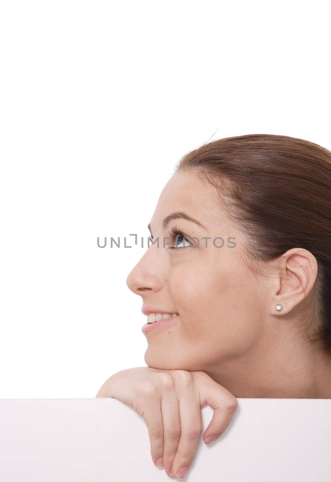 Closeup portrait of a happy young woman smiling isolated on white background
