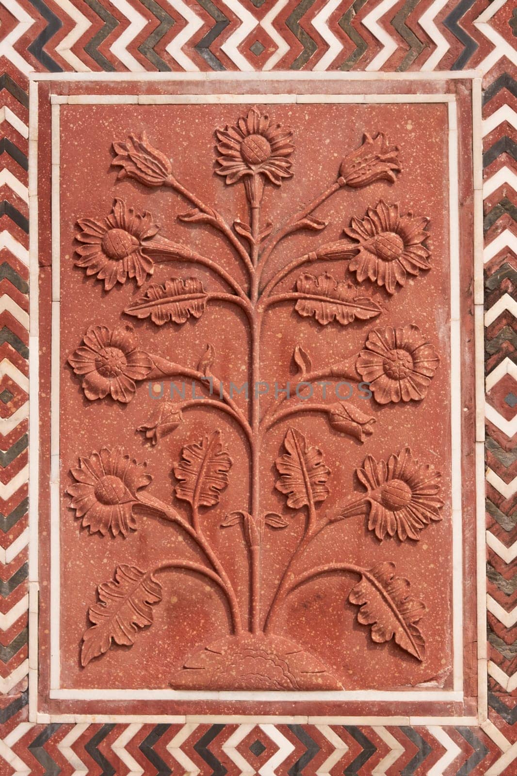 Detail of decoration on the mosque at the Taj Mahal. Mughal style building of red sandstone inlaid with marble. Agra, Uttar Pradesh, India