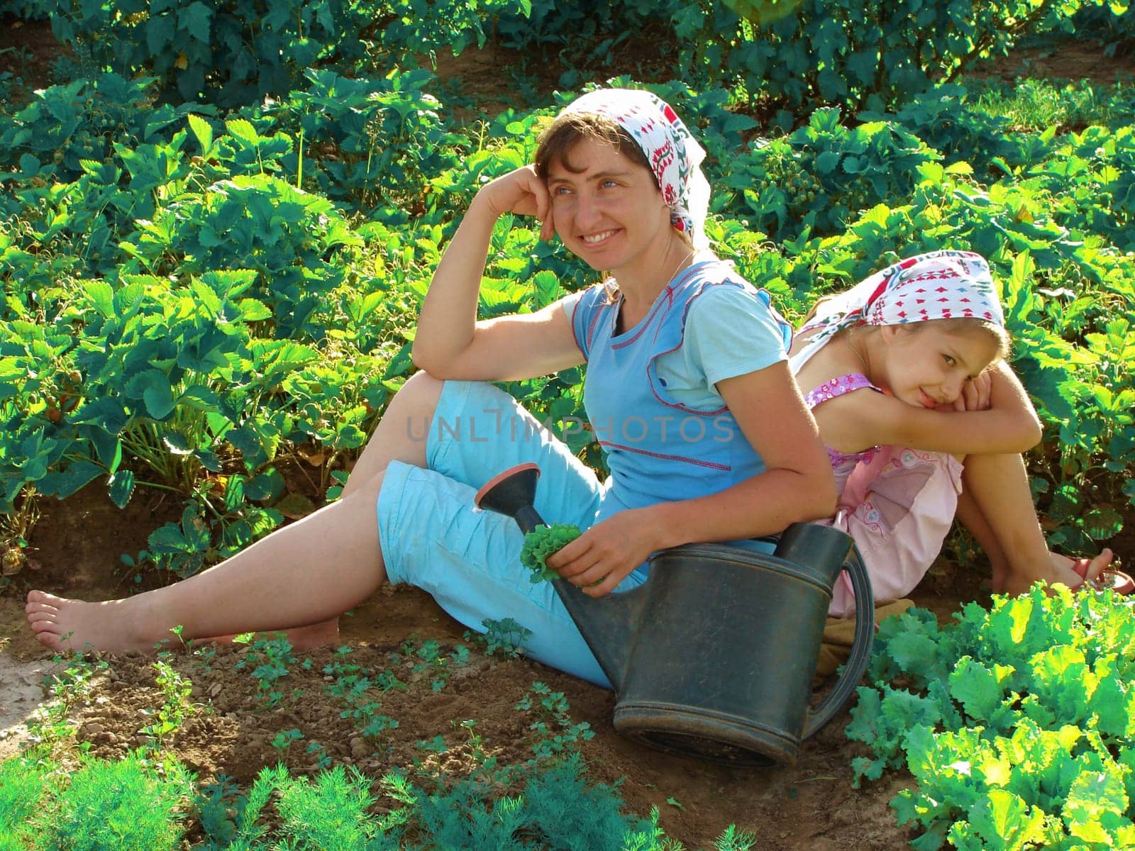 mother and daughter resting together